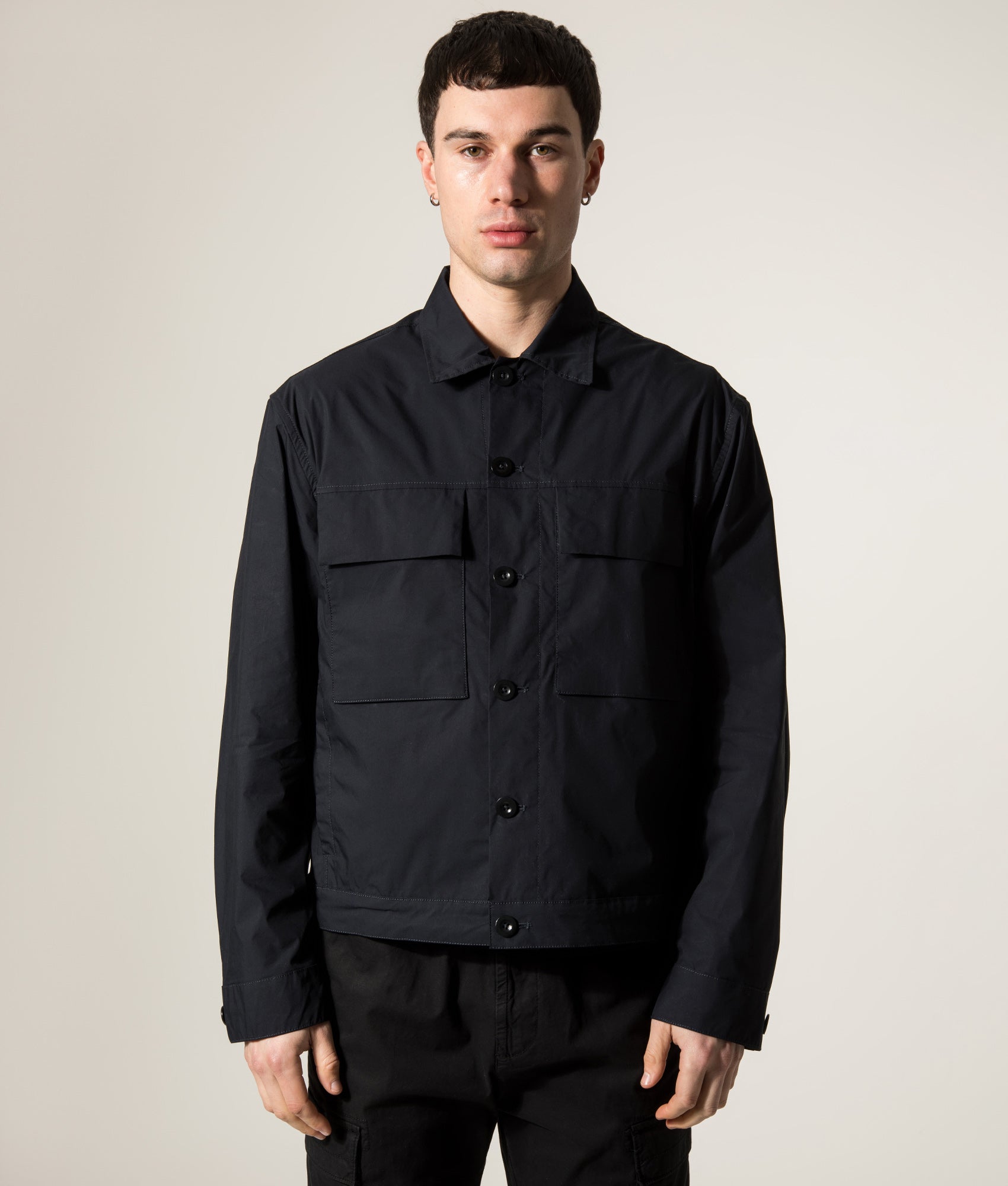 Ten c Piece Dyed Mid Layer Overshirt in Blue at EQVVS Menswear. Model front shot.