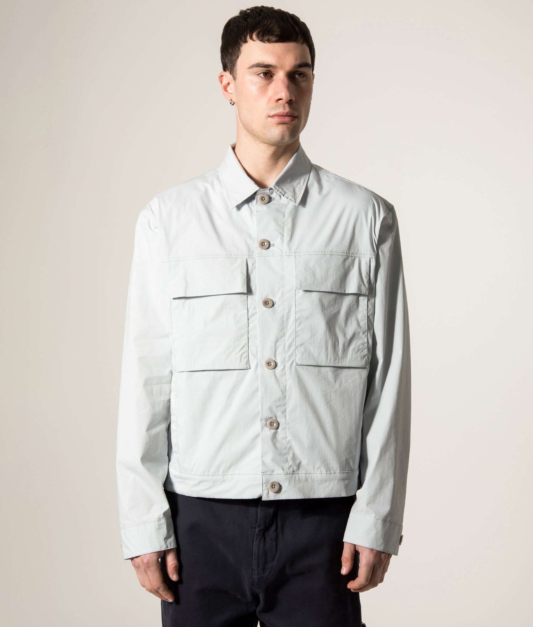 Ten c Piece Dyed Mid Layer Overshirt in Grey Microchip at EQVVS Menswear. Model front shot.