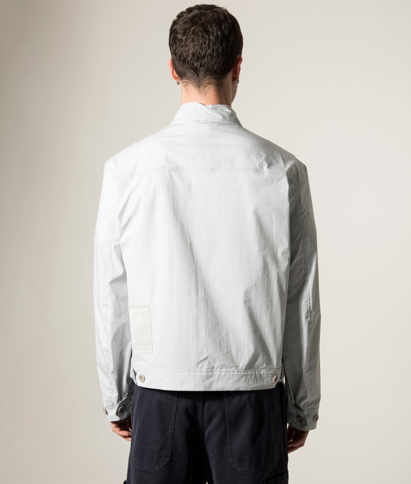 Ten c Piece Dyed Mid Layer Overshirt in Grey Microchip at EQVVS Menswear. Back shot.