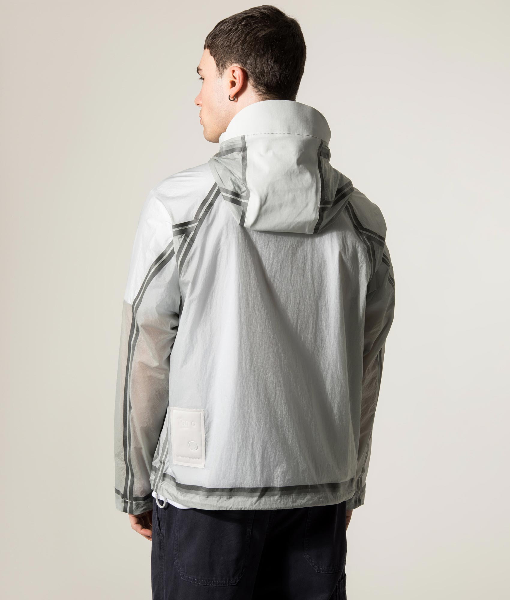 Ten c Nastrati Combo Bonded Anorak Jacket in Grey Microchip at EQVVS Menswear. Model back shot.