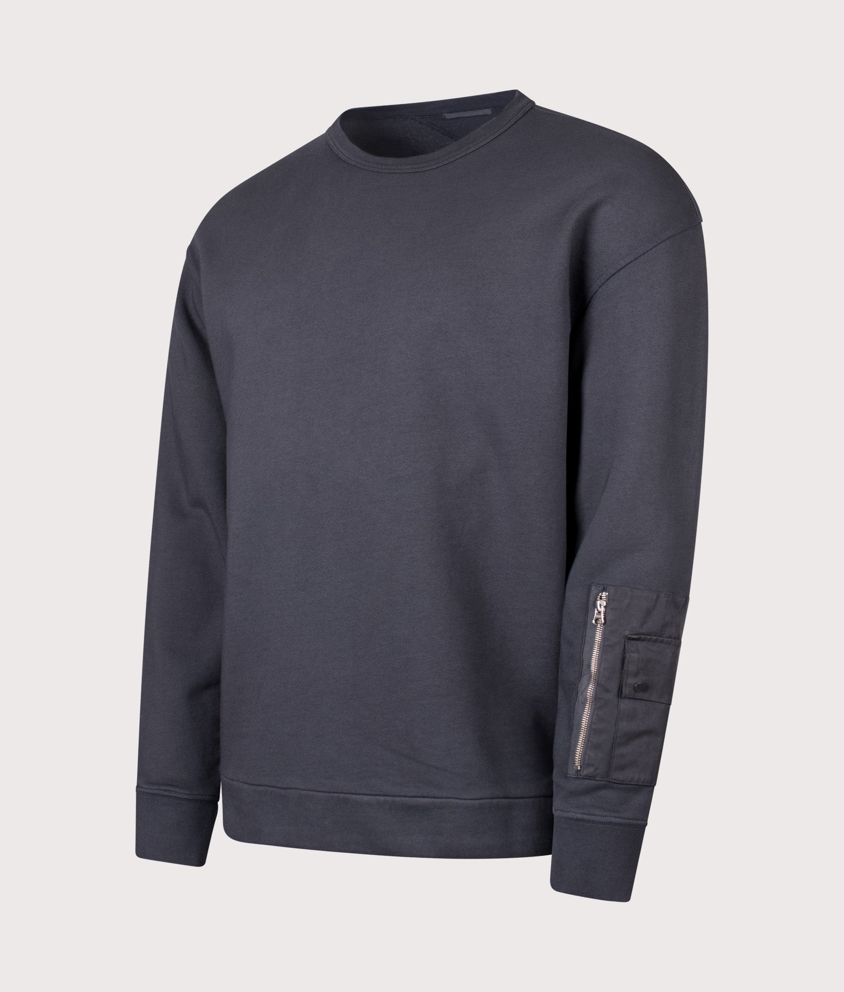 Ten c Garment Dyed Diagonal Fleece Sweatshirt in Grey Smog at EQVVS Menswear. Angled front shot. 