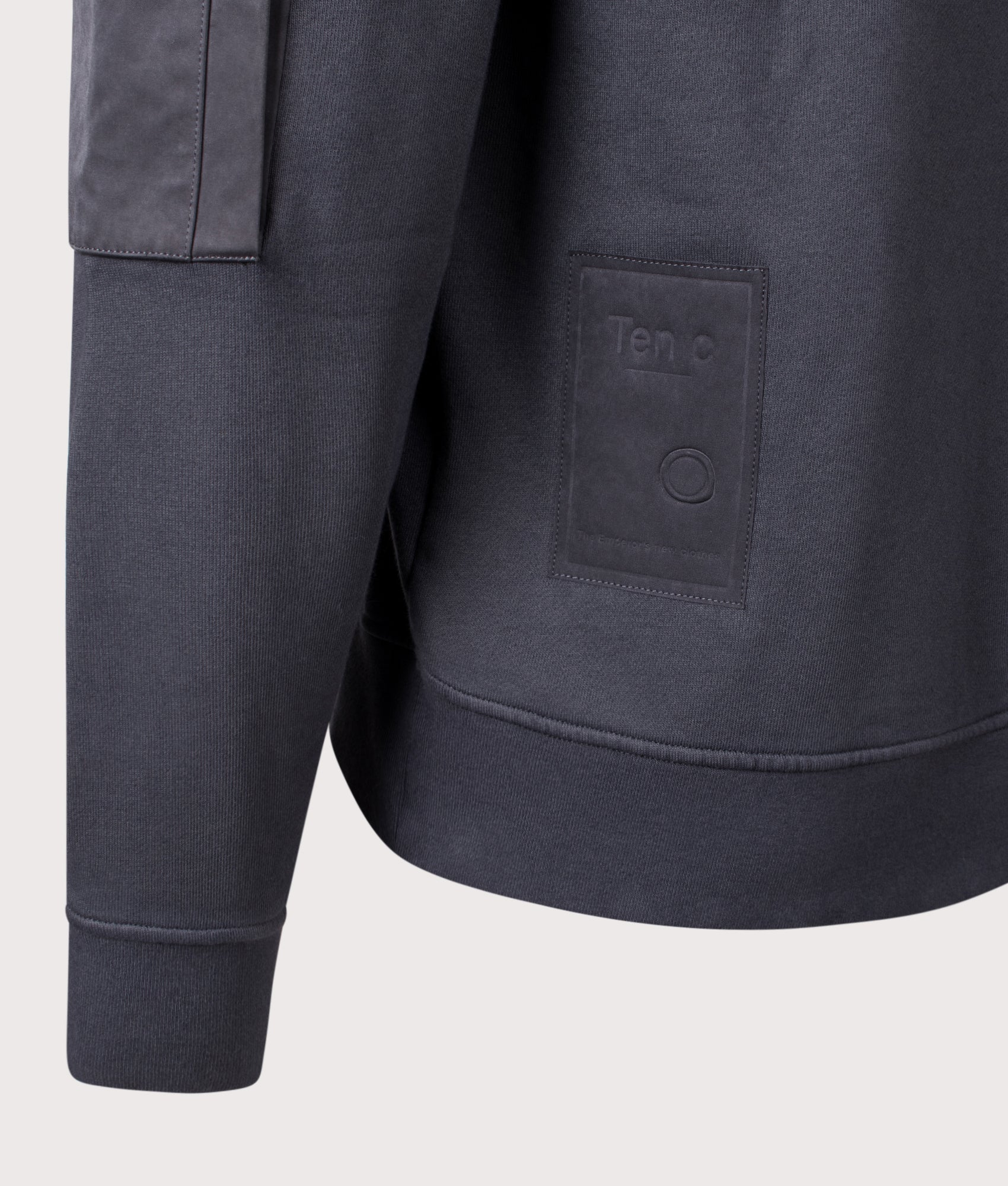 Ten C Garment Dyed Diagonal Fleece Quarter Zip Sweatshirt in Grey Smog at EQVVS Menswear. Detail shot.