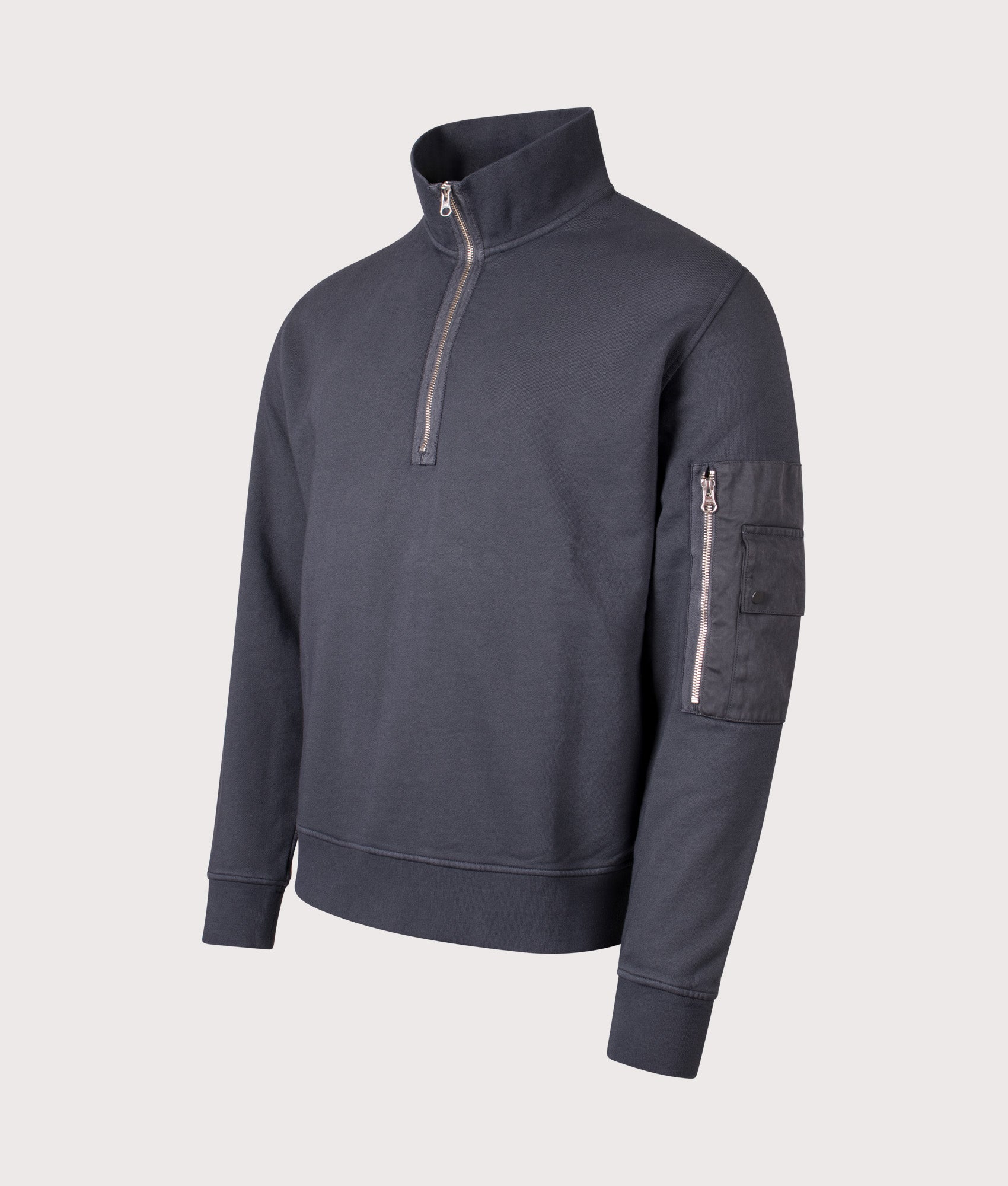 Ten C Garment Dyed Diagonal Fleece Quarter Zip Sweatshirt in Grey Smog at EQVVS Menswear. Angled front shot.