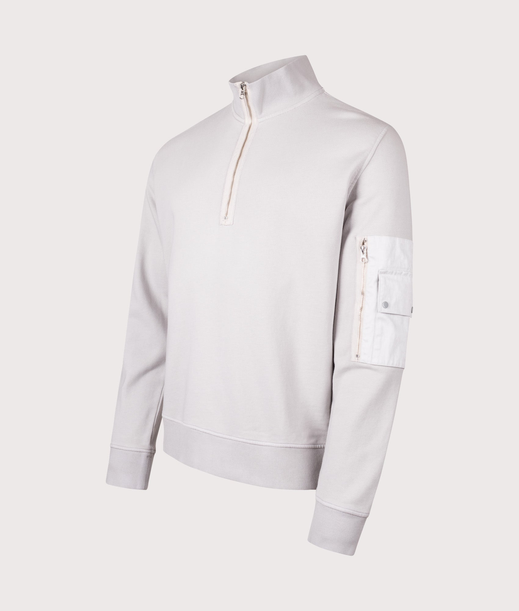 Ten c Garment Dyed Diagonal Fleece Quarter Zip Sweatshirt in Grey Cloud at EQVVS Menswear. Angled front shot.