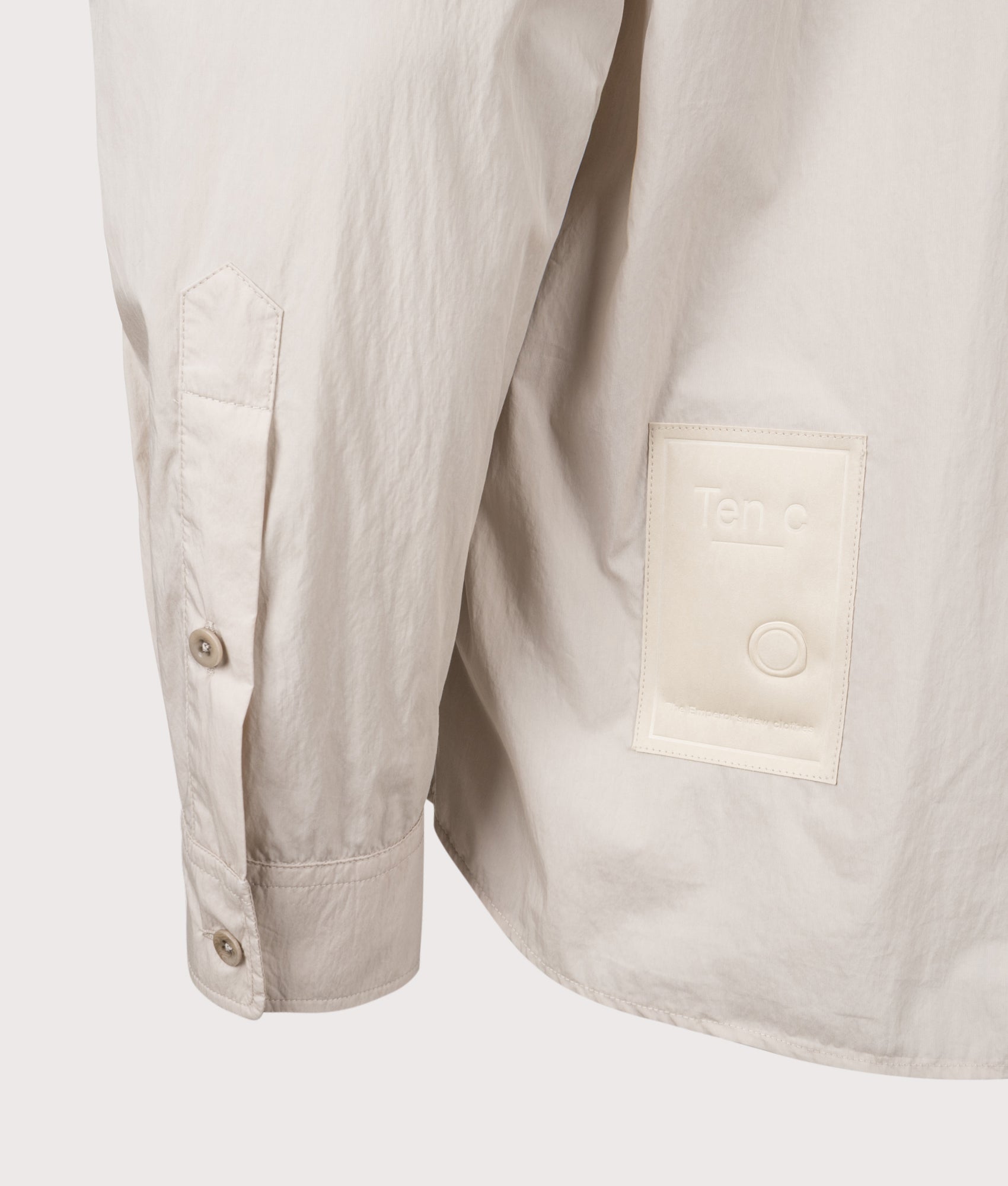 Ten c Piece Dyed Pocket Shirt in Grey Sand at EQVVS Menswear. Detail shot.