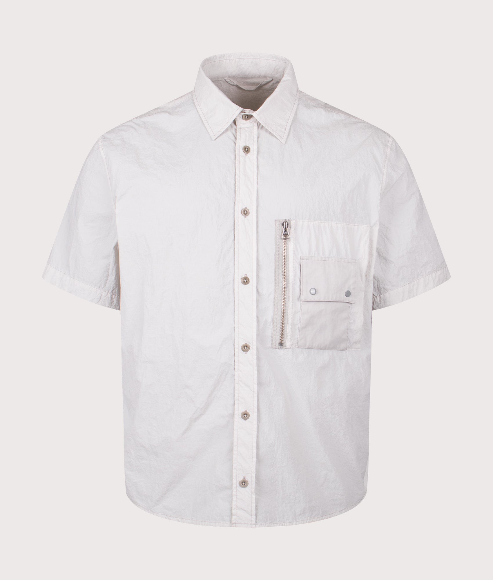 Ten c Garment Dyed Tactel Short Sleeve Shirt in Grey Cloud at EQVVS Menswear. Front shot.