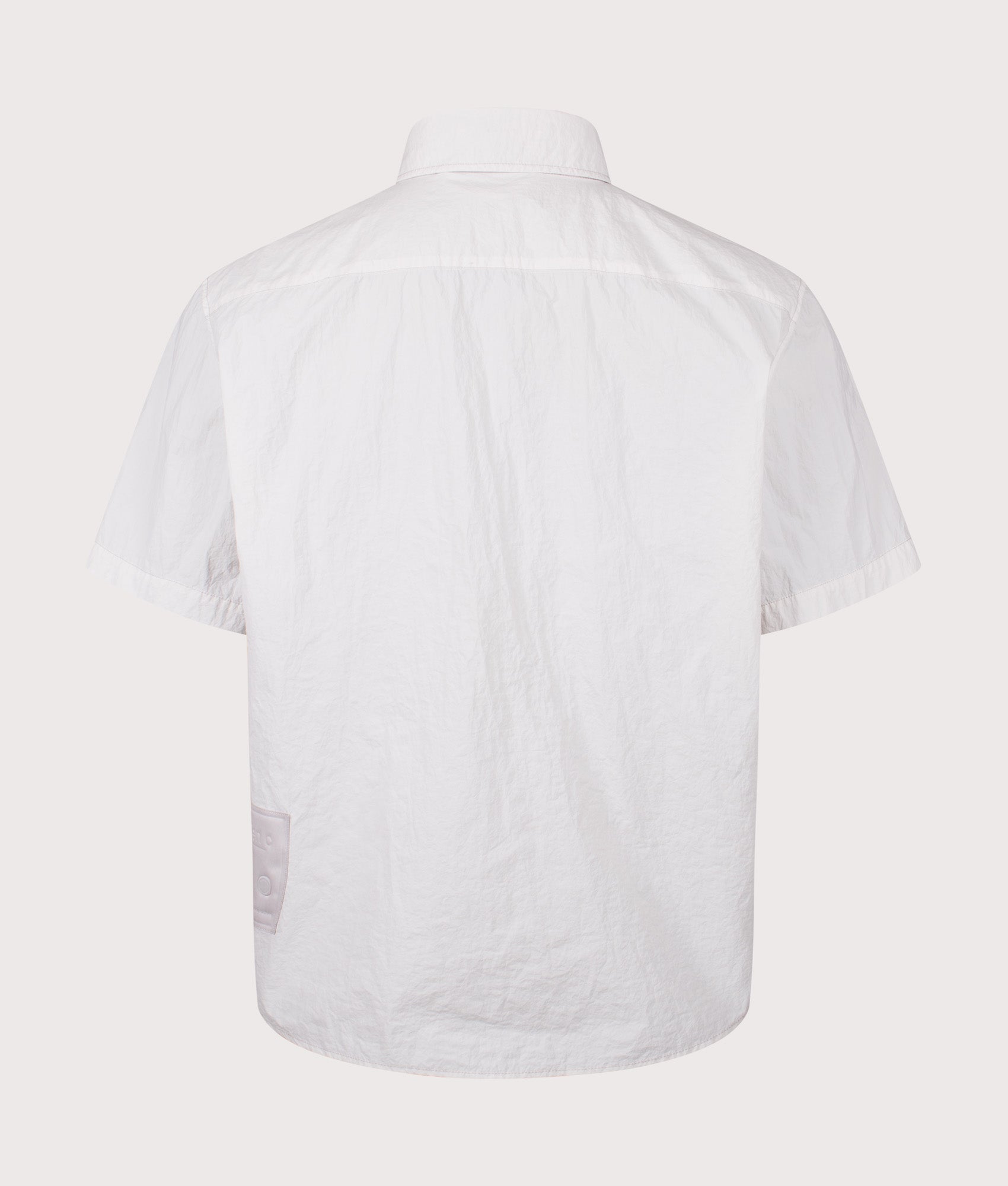 Ten c Garment Dyed Tactel Short Sleeve Shirt in Grey Cloud at EQVVS Menswear. Back shot.