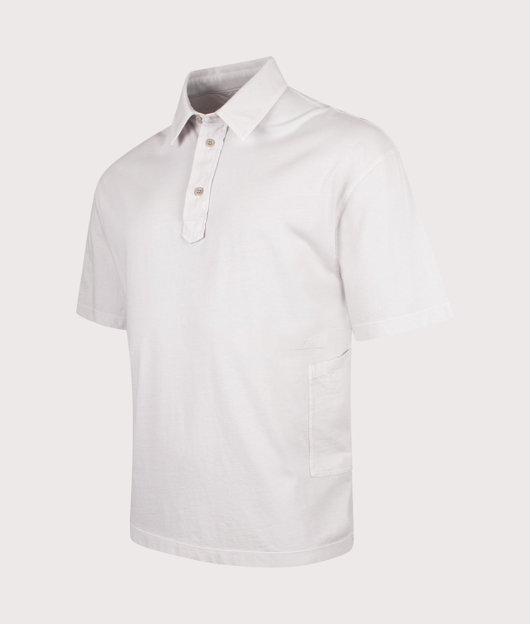 Ten c Light Marmo Dyed Polo Shirt in Grey Cloud at EQVVS Menswear. Angled front shot.