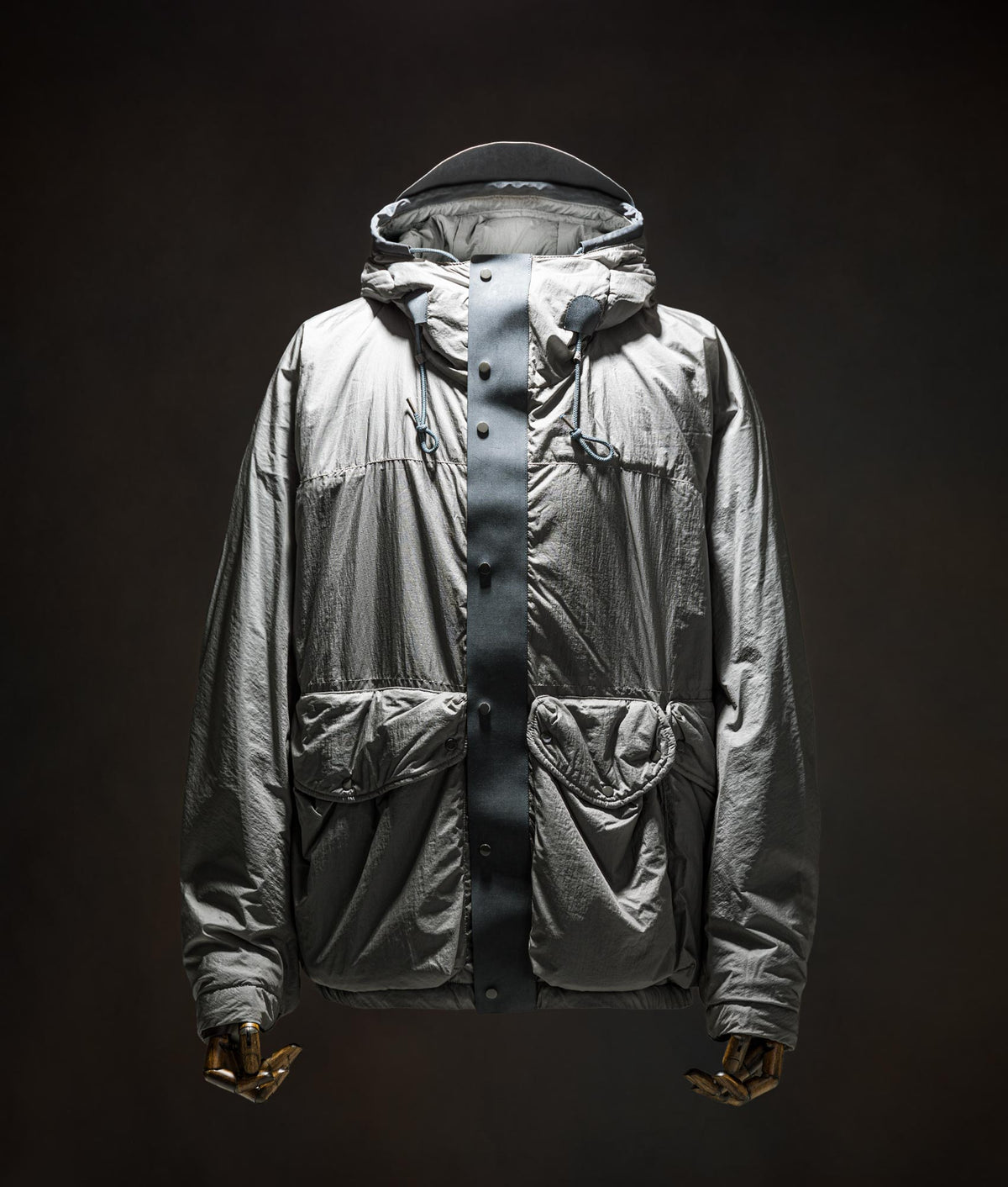 Ten c Lightly Padded Skye Ten Anorak Jacket in Iron Grey at EQVVS Menswear. Campaign shot.