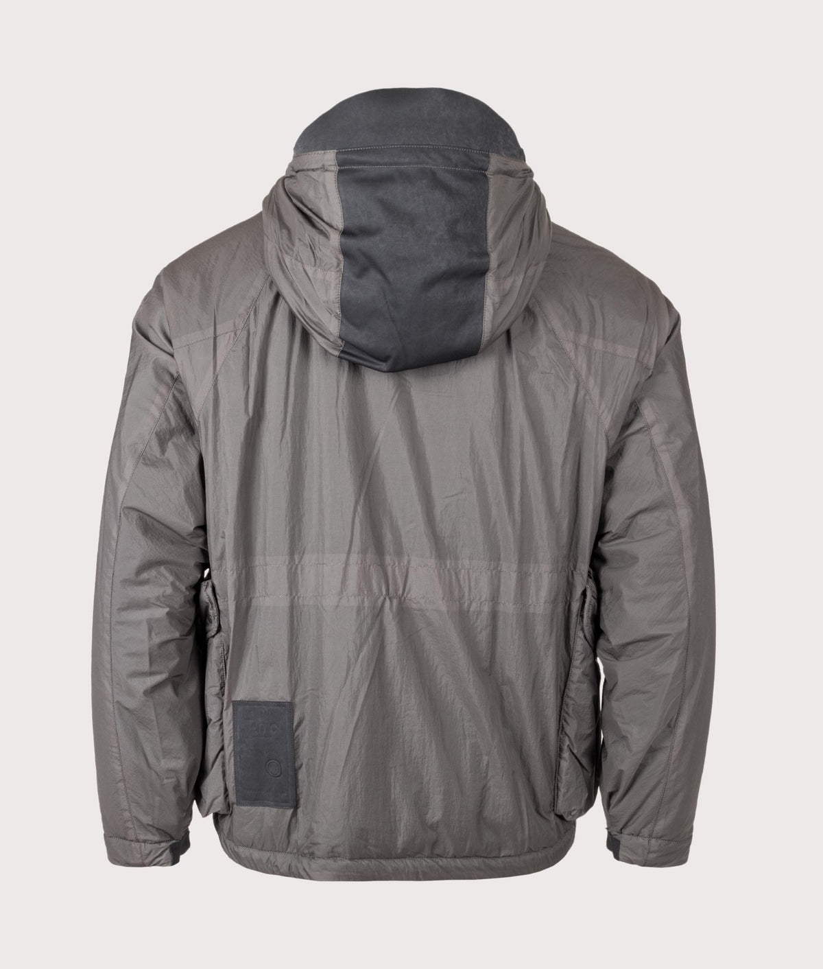 Lightly Padded Skye Ten Anorak Jacket by Ten c in Iron Grey. Shot by EQVVS. Back shot.