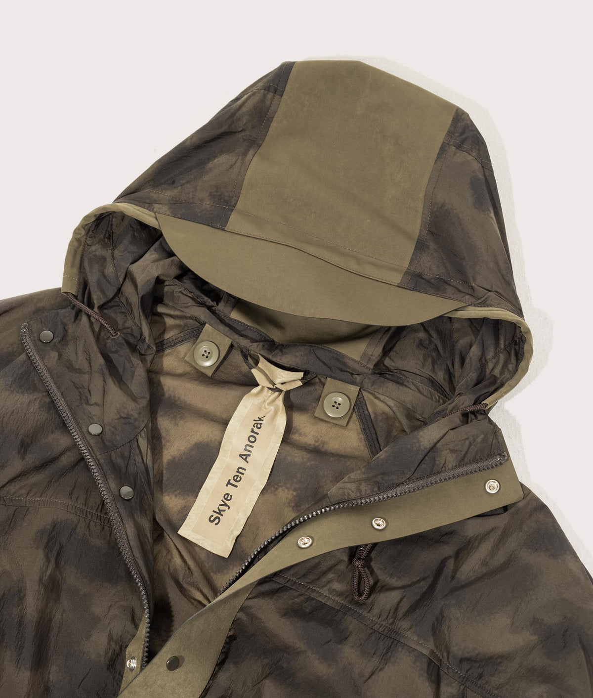 Camou Skye Ten Anorak Jacket by Ten c in Olive Green. Shot by EQVVS. Detail shot.