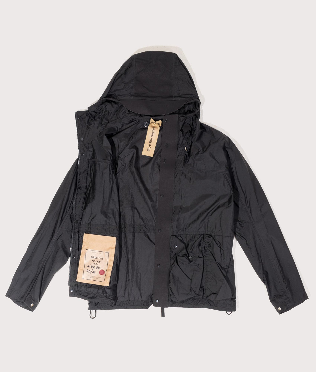 Skye Ten Anorak Jacket by Ten c in Black. Shot by EQVVS. Flat shot.