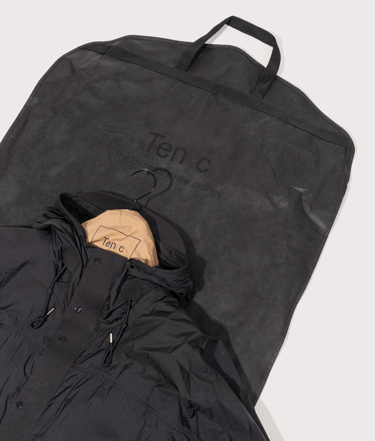 Skye Ten Anorak Jacket by Ten c in Black. Shot by EQVVS. Dust bag shot.