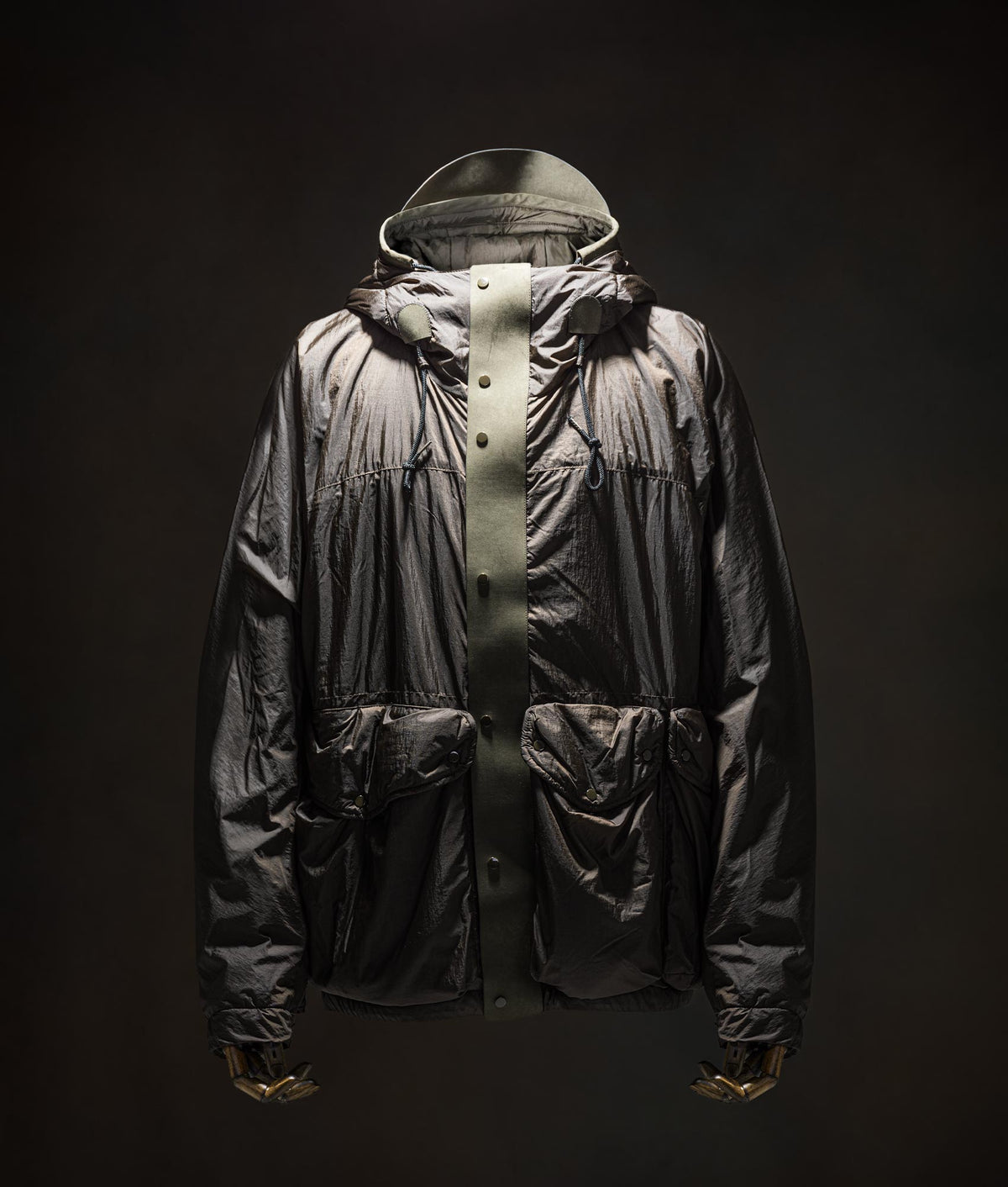 Ten c Lightly Padded Skye Ten Anorak Jacket in Green Lizard at EQVVS Menswear. Front shot.