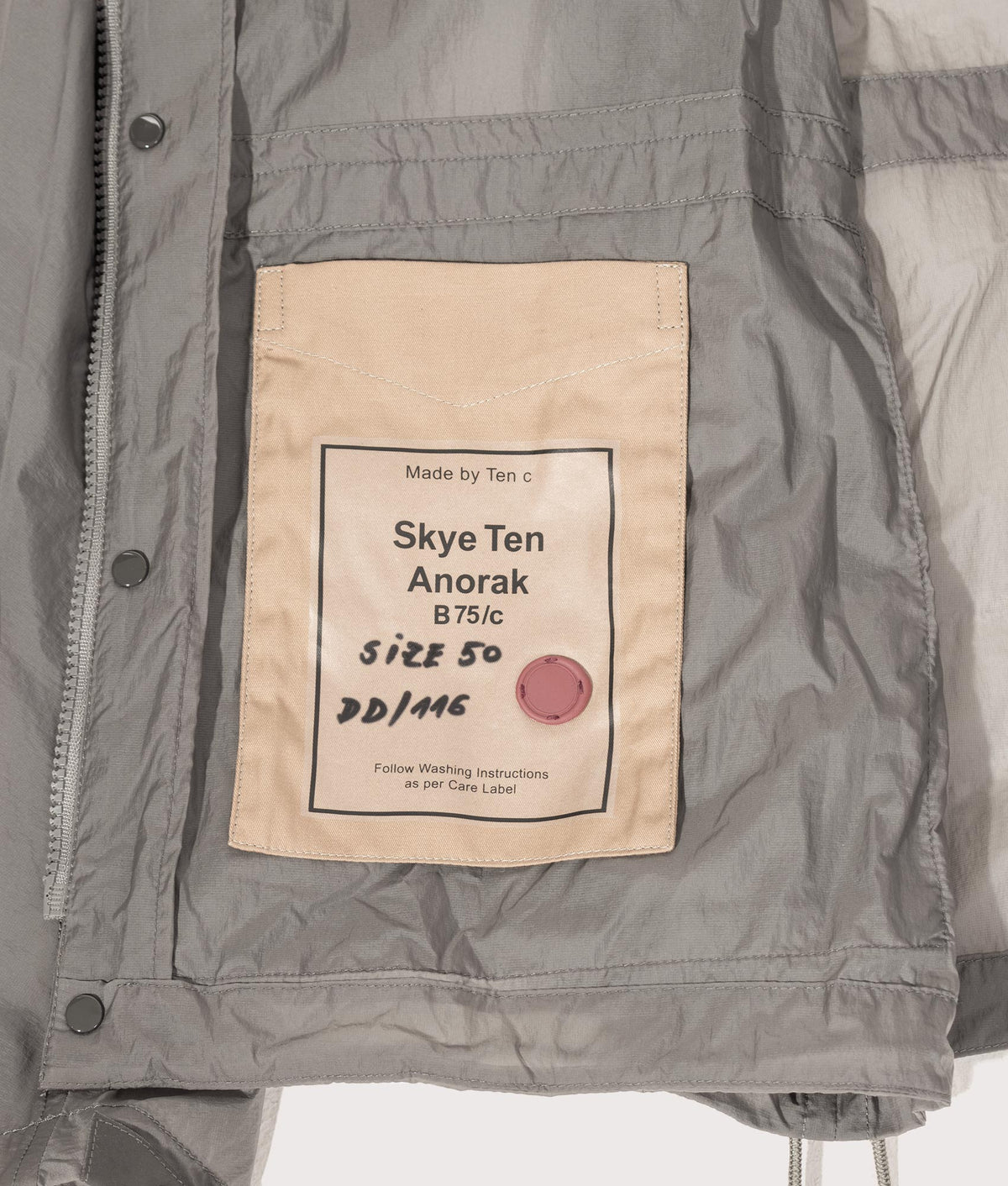 Skye Ten Anorak Jacket by Ten c in Iron Grey. Shot by EQVVS. Inner label shot.