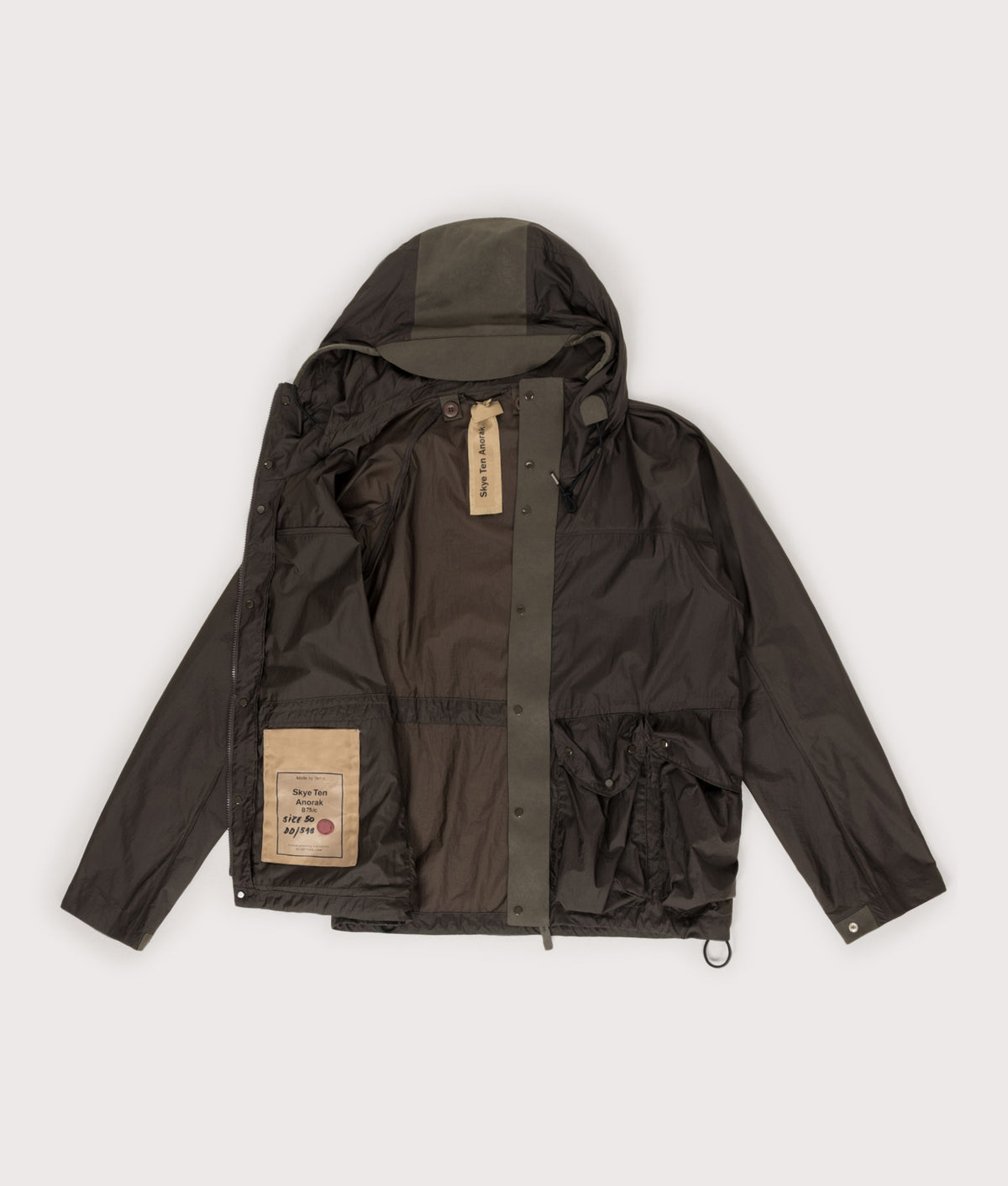 Ten c Skye Ten Anorak Jacket in Green Lizard at EQVVS Menswear. Flat shot.