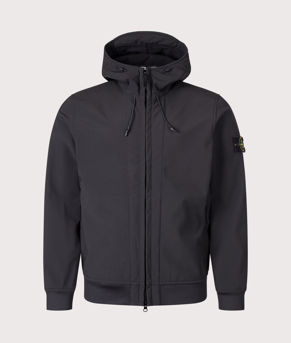 Stone Island Soft Shell-R_E DYE® Technology Jacket in Black at EQVVS Menswear. Front shot.