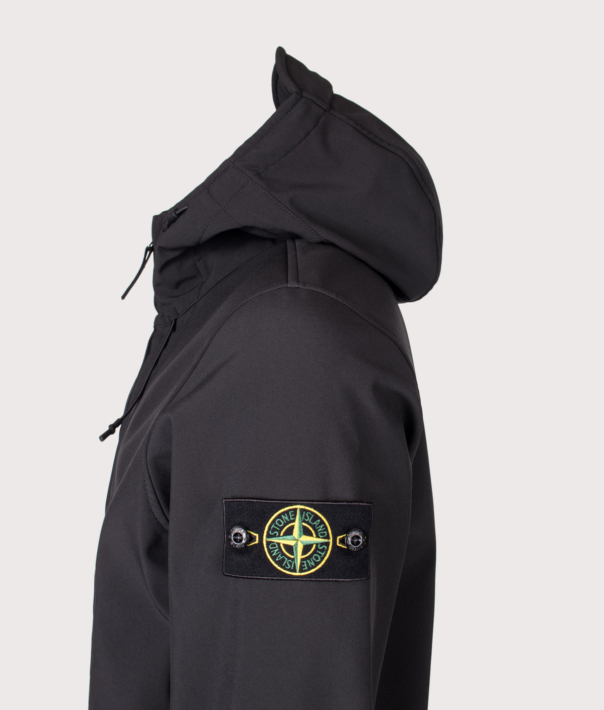 Stone Island Soft Shell-R_E DYE® Technology Jacket in Black at EQVVS Menswear. Detail shot.