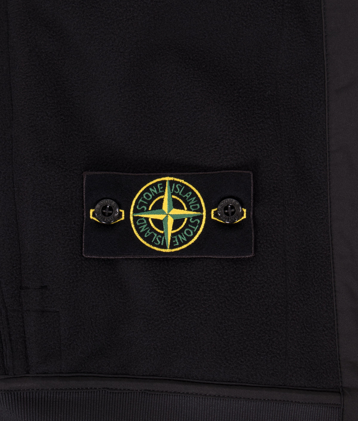 Stone Island Soft Shell-R_E DYE® Technology Jacket in Black at EQVVS Menswear. Inside detail shot.