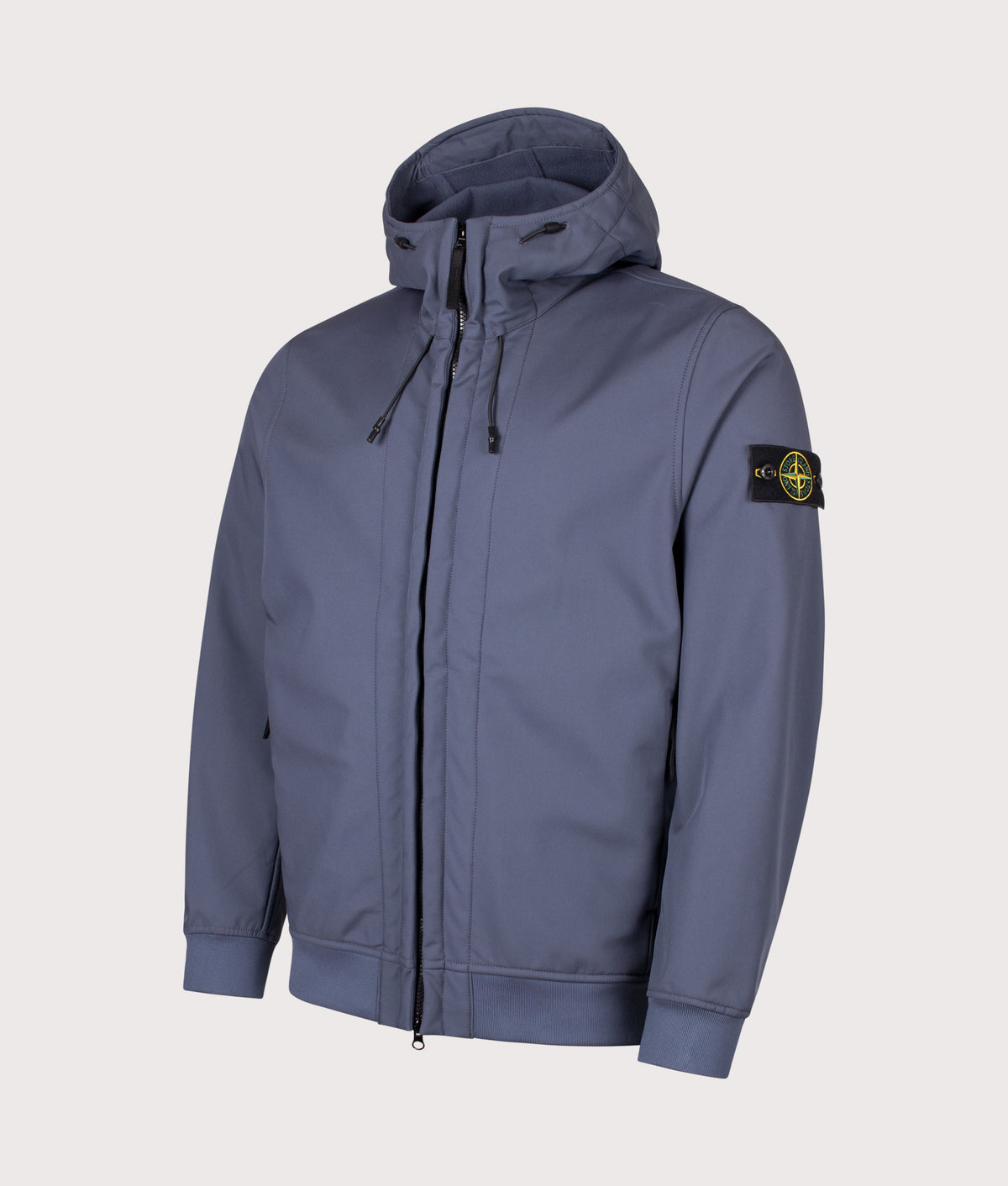 Stone Island Soft Shell-R_E.Dye® Technology Jacket in Slate Blue at EQVVS Menswear. Angled front shot.