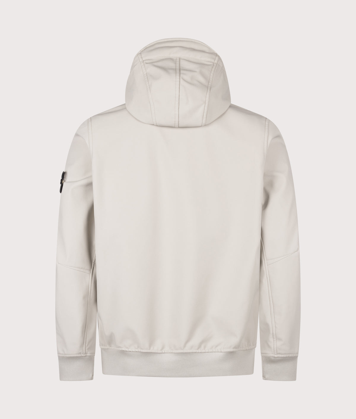 Stone Island Soft Shell-R_E.Dye® Technology Jacket in sand at EQVVS Menswear. Back shot.