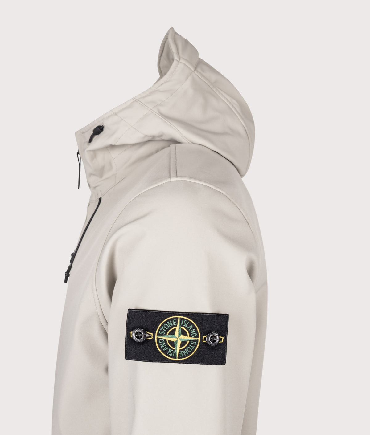 Stone Island Soft Shell-R_E.Dye® Technology Jacket in sand at EQVVS Menswear. Detail shot.