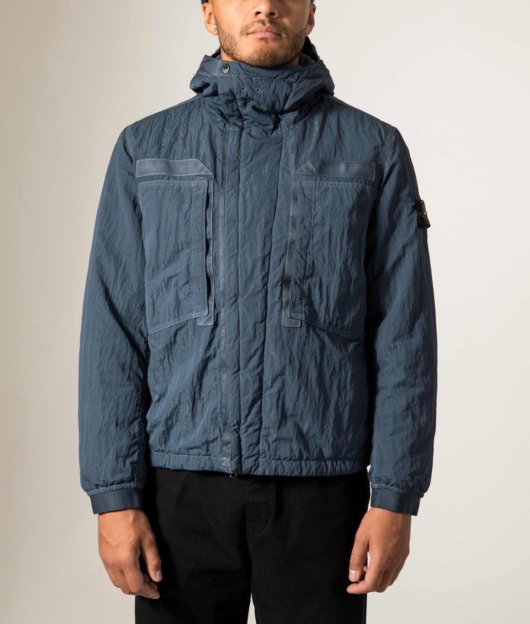 Stone Island Warp Rib Nylon-TC Jacket in Slate Blue at EQVVS Menswear. Model front shot.