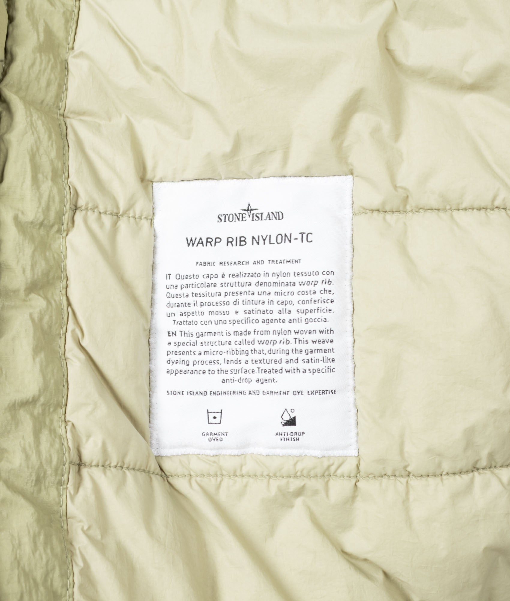 Stone Island Warp Rib Nylon-TC Jacket in Laurel Green at EQVVS Menswear. Internal label shot.