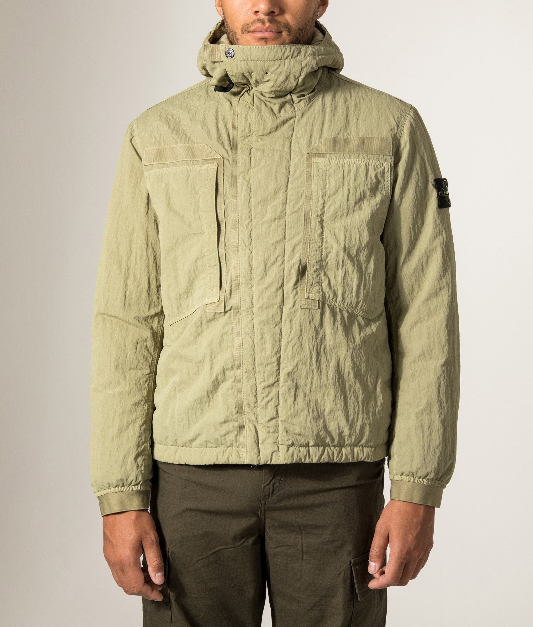 Stone Island Warp Rib Nylon-TC Jacket in Laurel Green at EQVVS Menswear. Model front shot.
