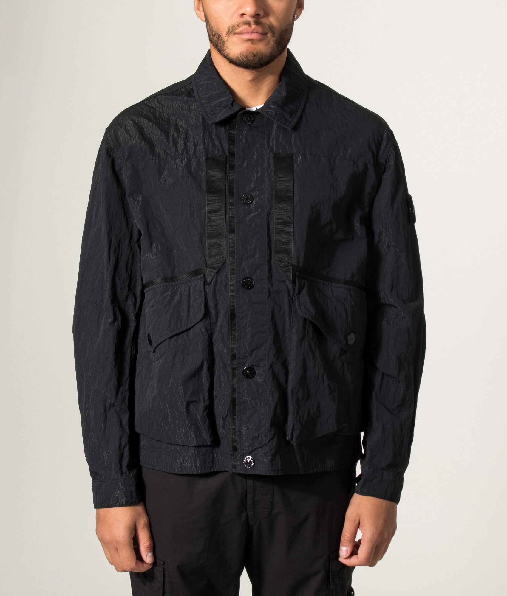 Stone Island Warp Rib Nylon-TC Jacket in Black at EQVVS Menswear. Model front shot.
