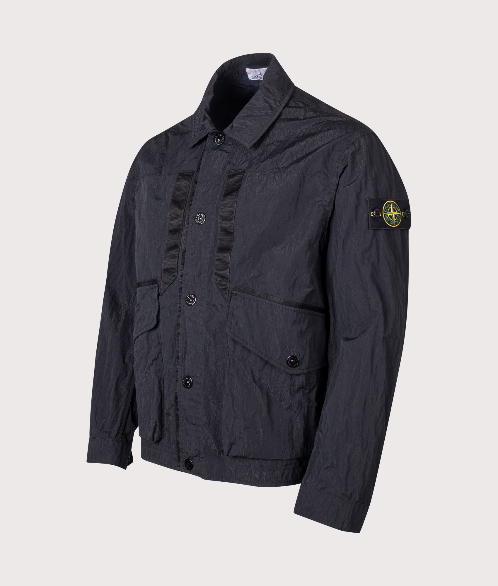 Stone Island Warp Rib Nylon-TC Jacket in Black at EQVVS Menswear. Angled front shot.