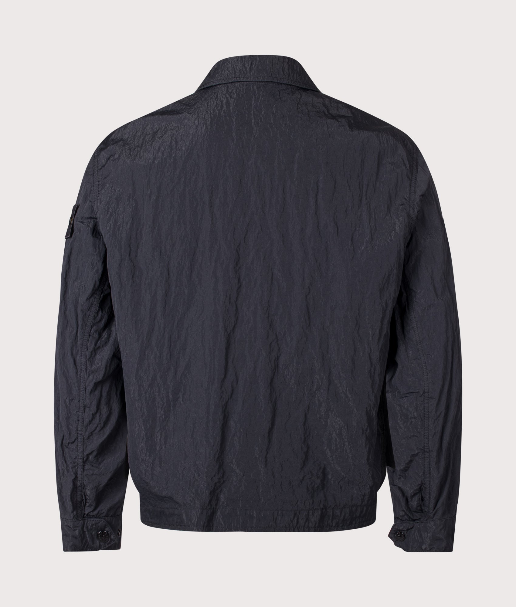 Stone Island Warp Rib Nylon-TC Jacket in Black at EQVVS Menswear. Back shot.