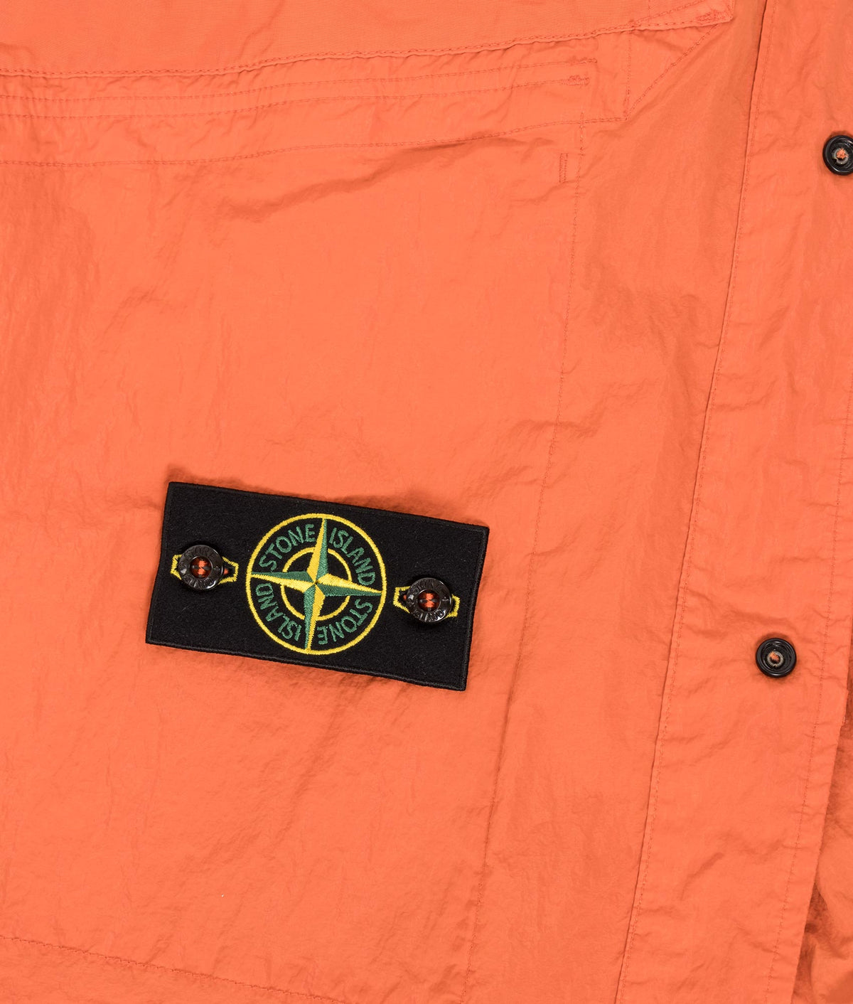 Stone Island Warp Rib Nylon-TC Jacket in Burnt Orange at EQVVS Menswear. Third detail shot.