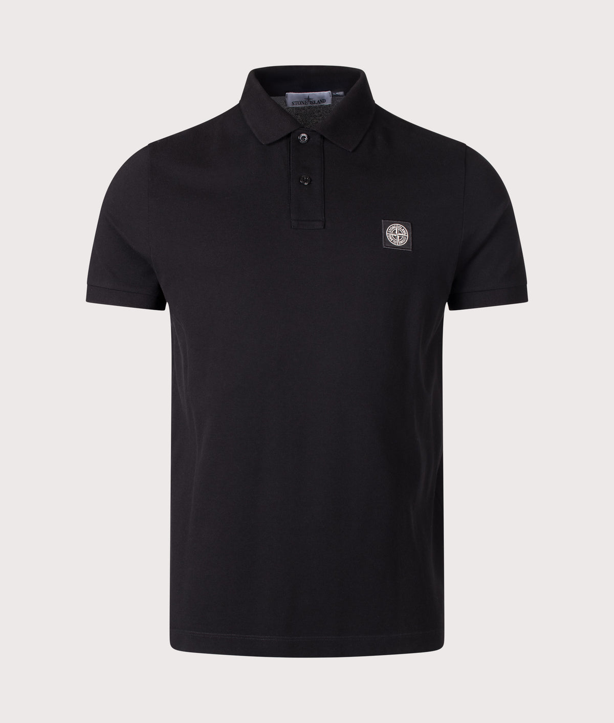 Stone Island Slim Fit Organic Cotton Piqué Polo Shirt in Black at EQVVS Menswear. Front shot.
