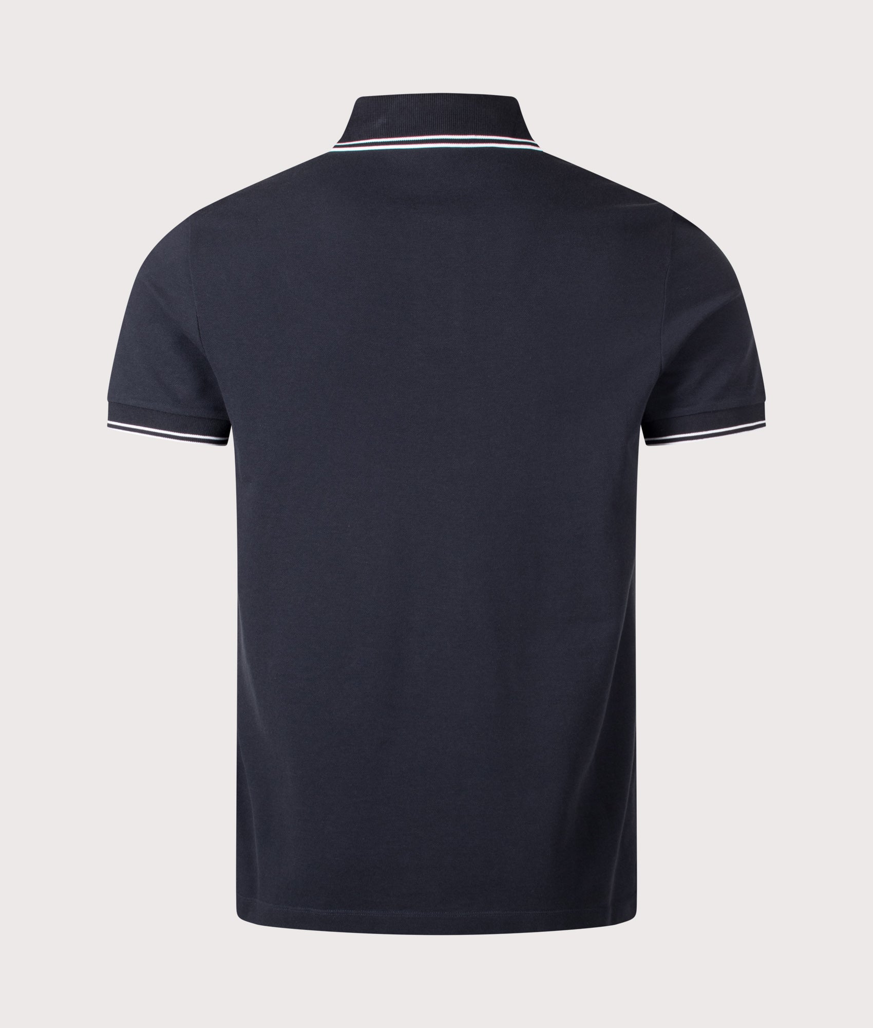 Stone Island Slim Fit Organic Cotton Polo Shirt in Navy Blue at EQVVS Menswear. Back shot.