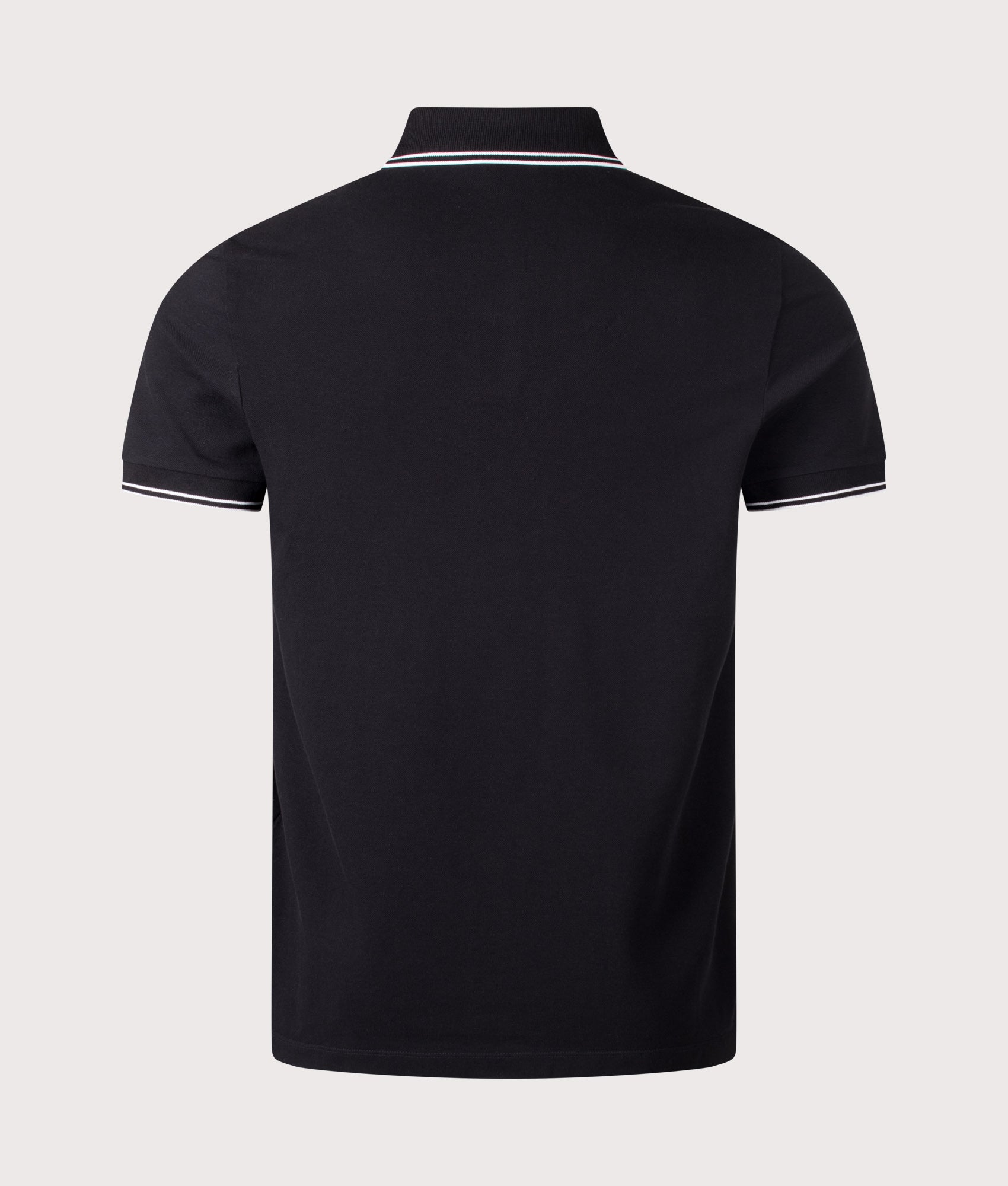 Stone Island Slim Fit Organic Cotton Polo Shirt in Black at EQVVS Menswear. Back shot.