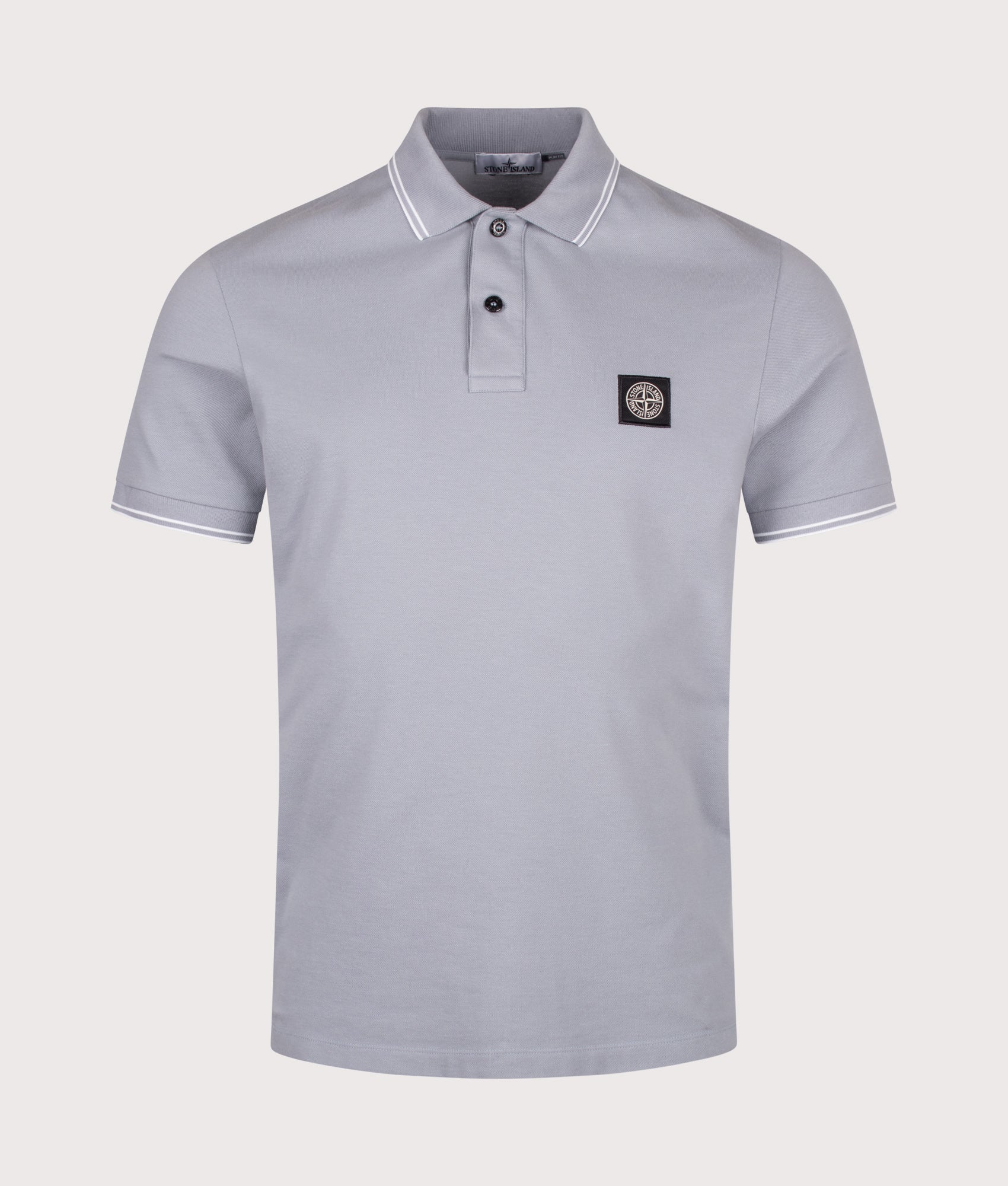 Stone Island Slim Fit Organic Cotton Polo Shirt in Ash Grey at EQVVS Menswear. Front shot.
