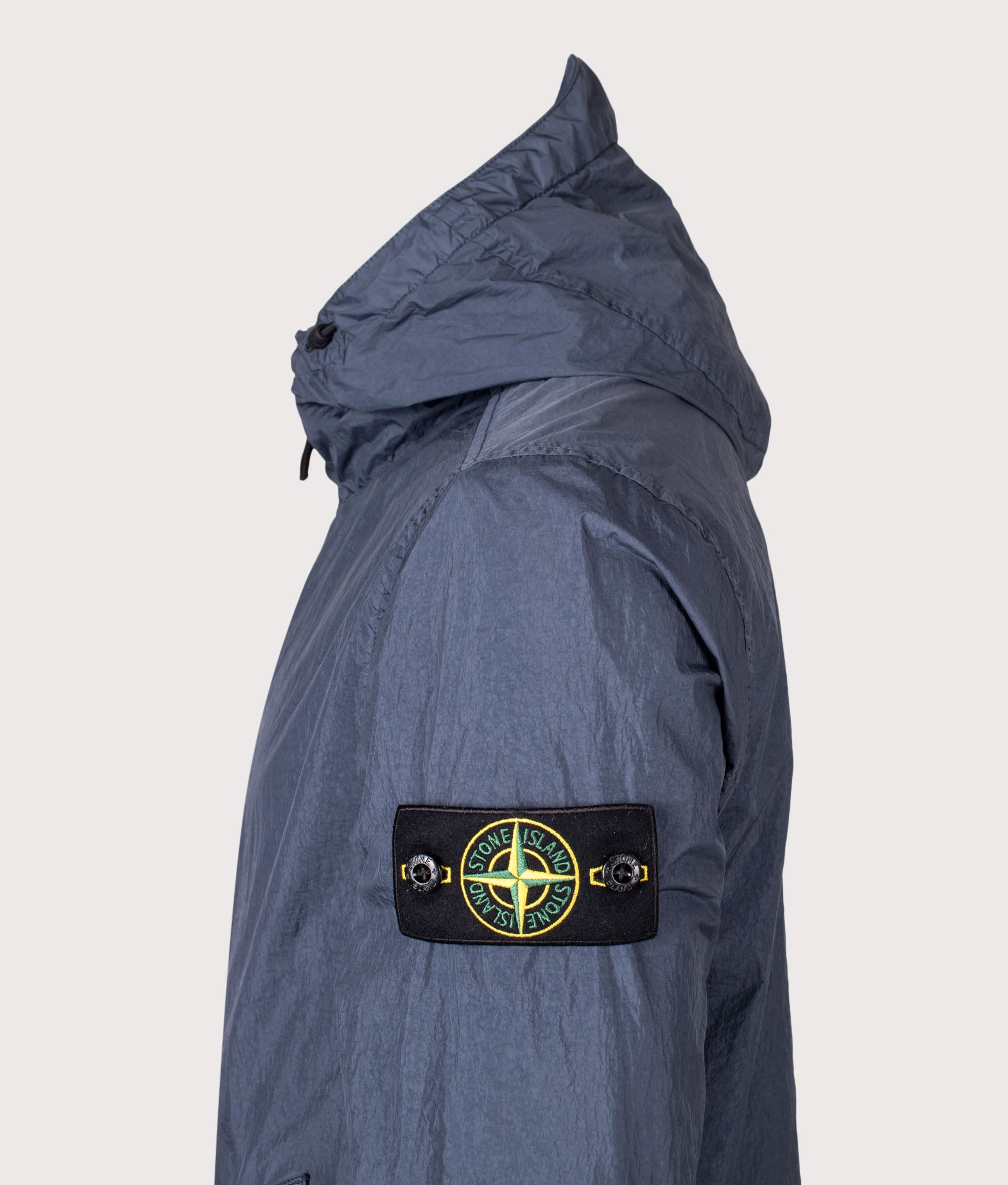 Stone Island Garment Dyed Crinkle Reps NY Jacket in Slate Blue at EQVVS Menswear. Detail shot.