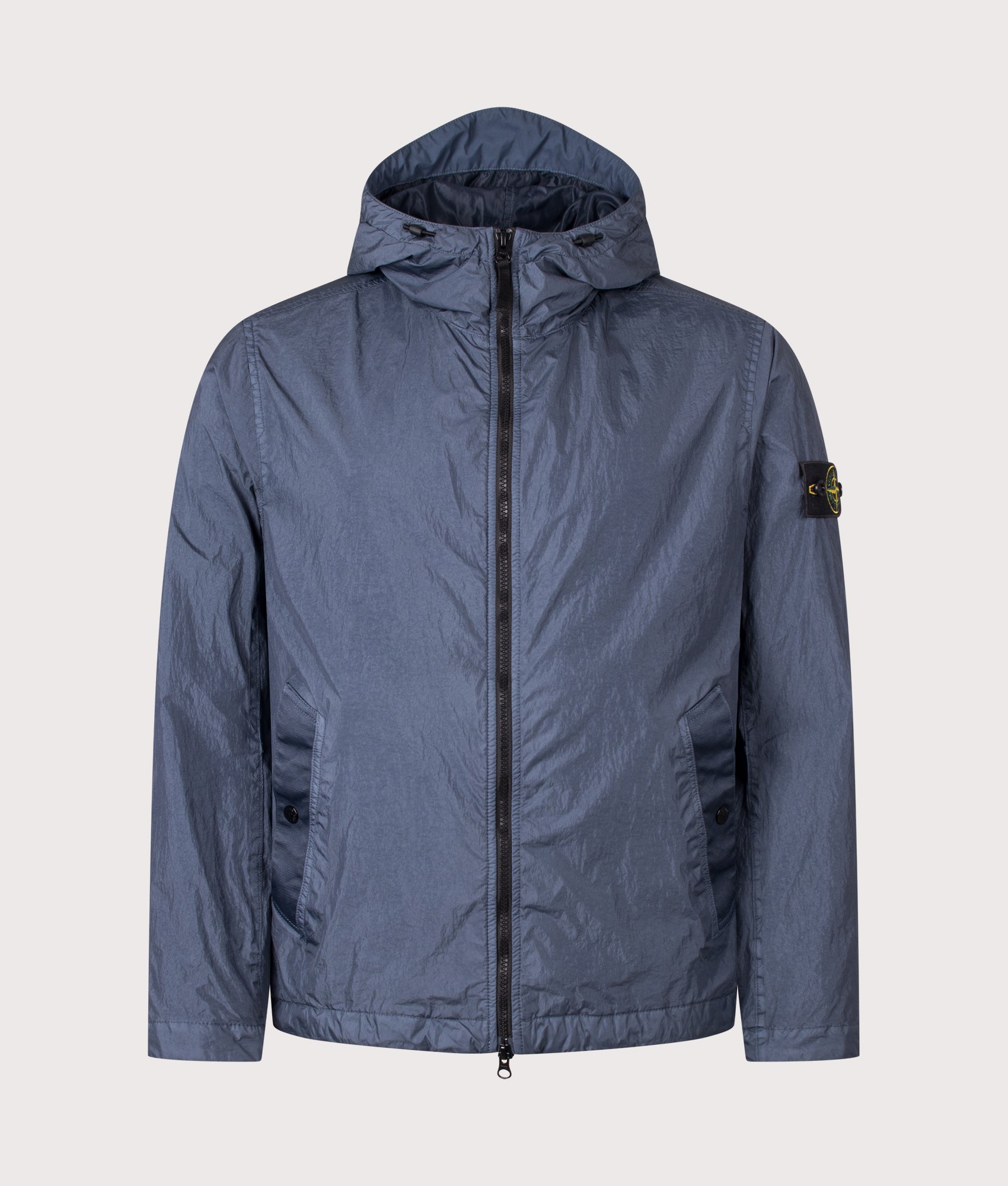 Stone Island Garment Dyed Crinkle Reps NY Jacket in Slate Blue at EQVVS Menswear. Front shot.