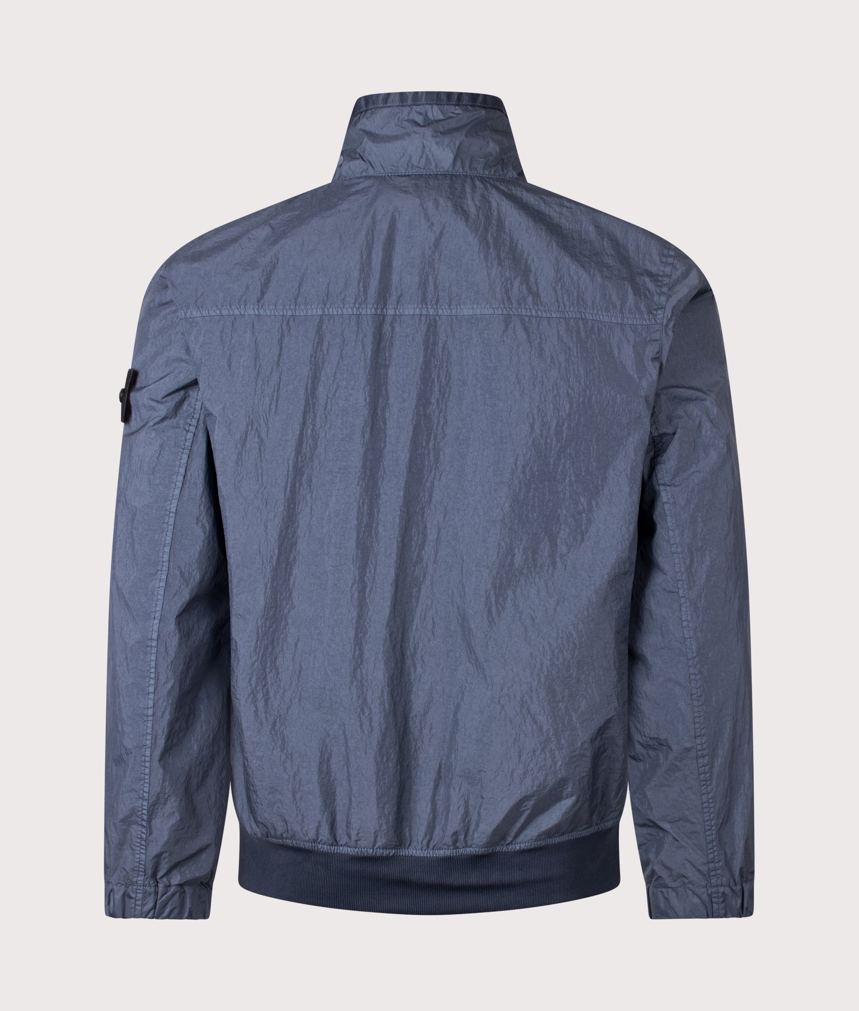 Stone Island Garment Dyed Crinkle Reps NY Jacket  in Slate Blue at EQVVS Menswear. Back shot.