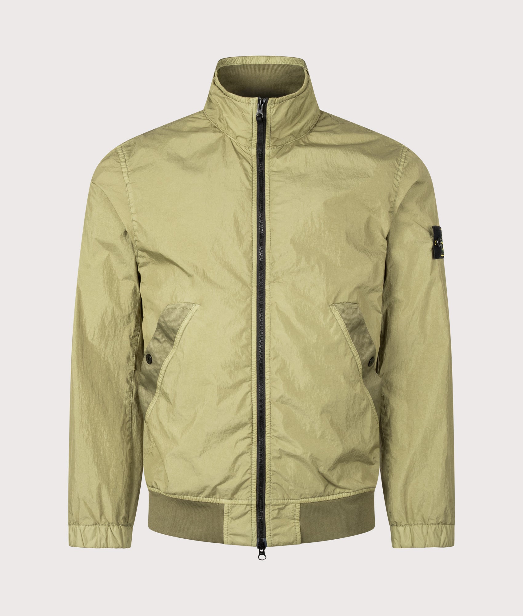Stone Island Garment Dyed Crinkle Reps NY Jacket in Laurel Green at EQVVS Menswear. Front shot.