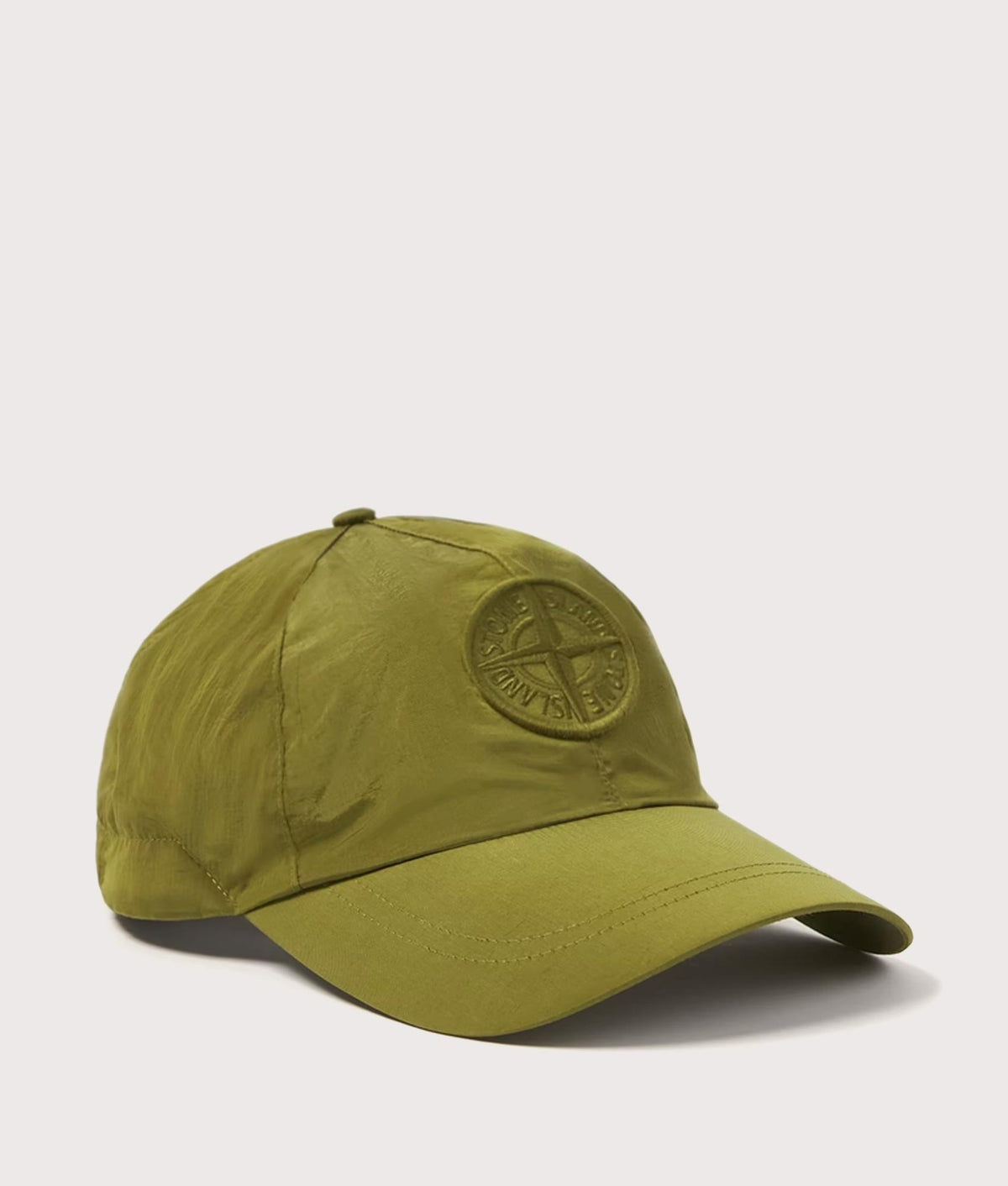 Stone Island Nylon Metal in Econyl® Cap in Cactus at EQVVS Menswear. Angled front shot.