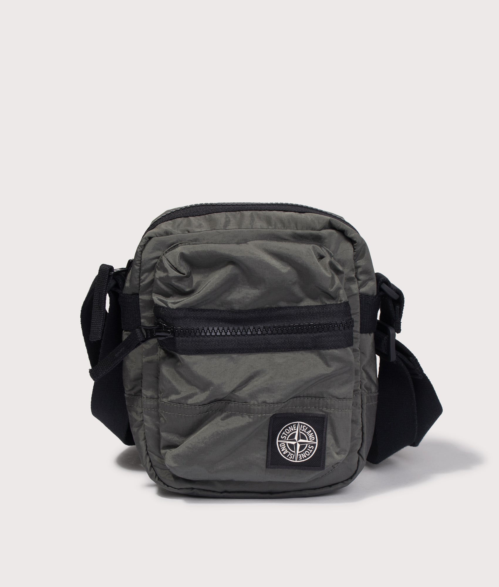 Stone Island Coated Nylon Metal in Econyl® Crossbody Bag in Musk at EQVVS Menswear. Front shot.