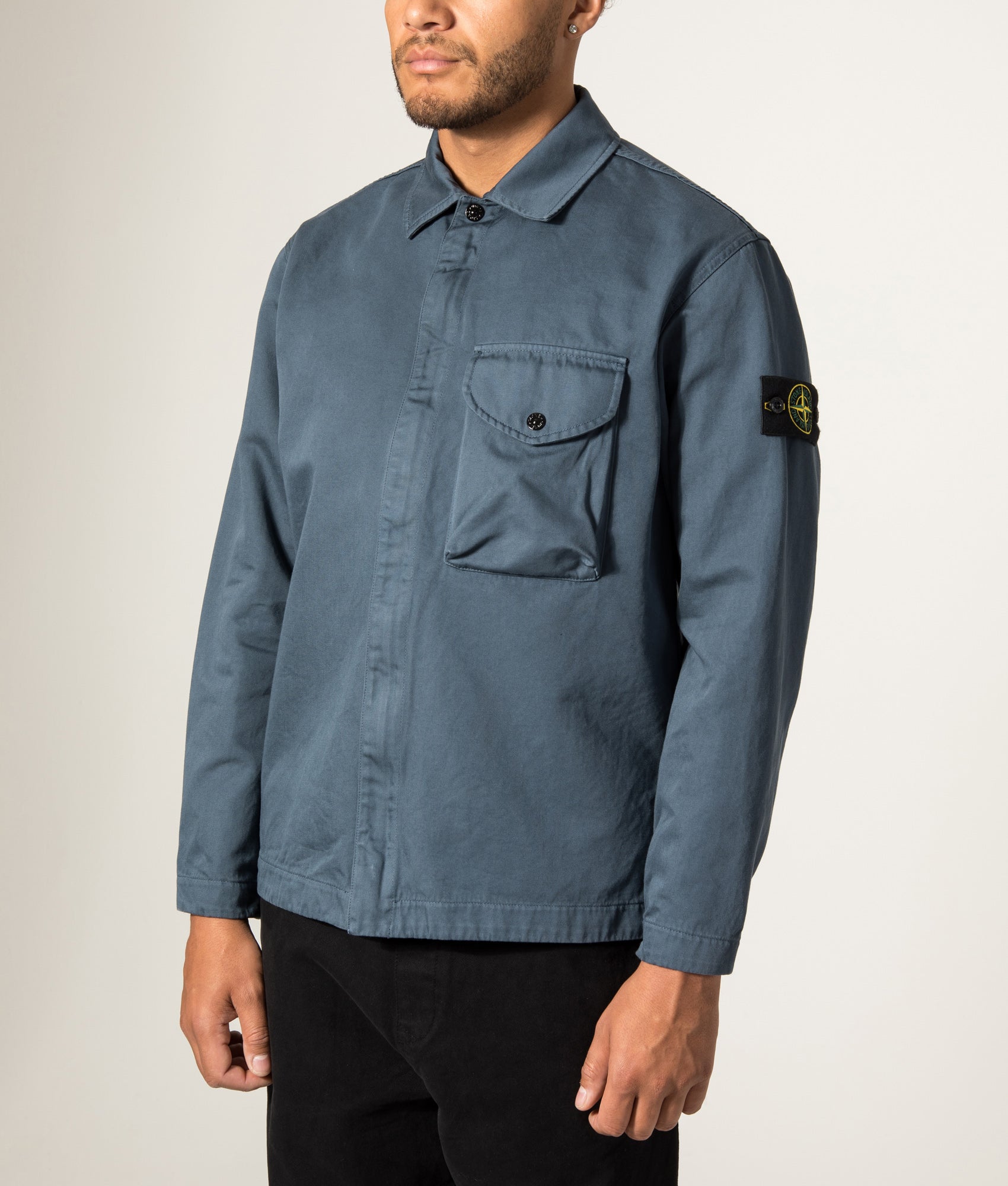 Stone Island Overshirt in Slate Blue at EQVVS Menswear. Angled model front shot.