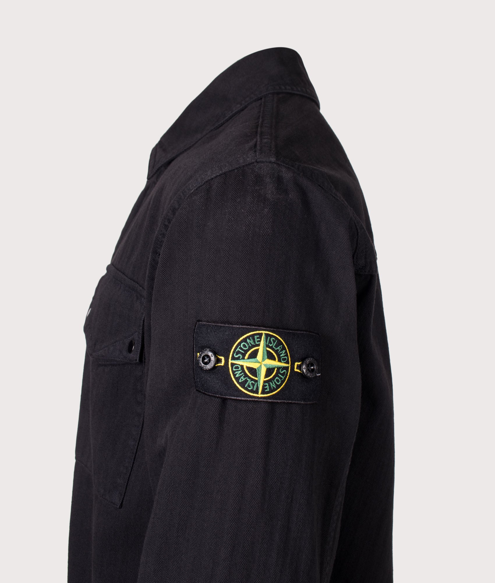 Stone Island Organic Cotton Twill Overshirt in Black at EQVVS Menswear. Detail shot.