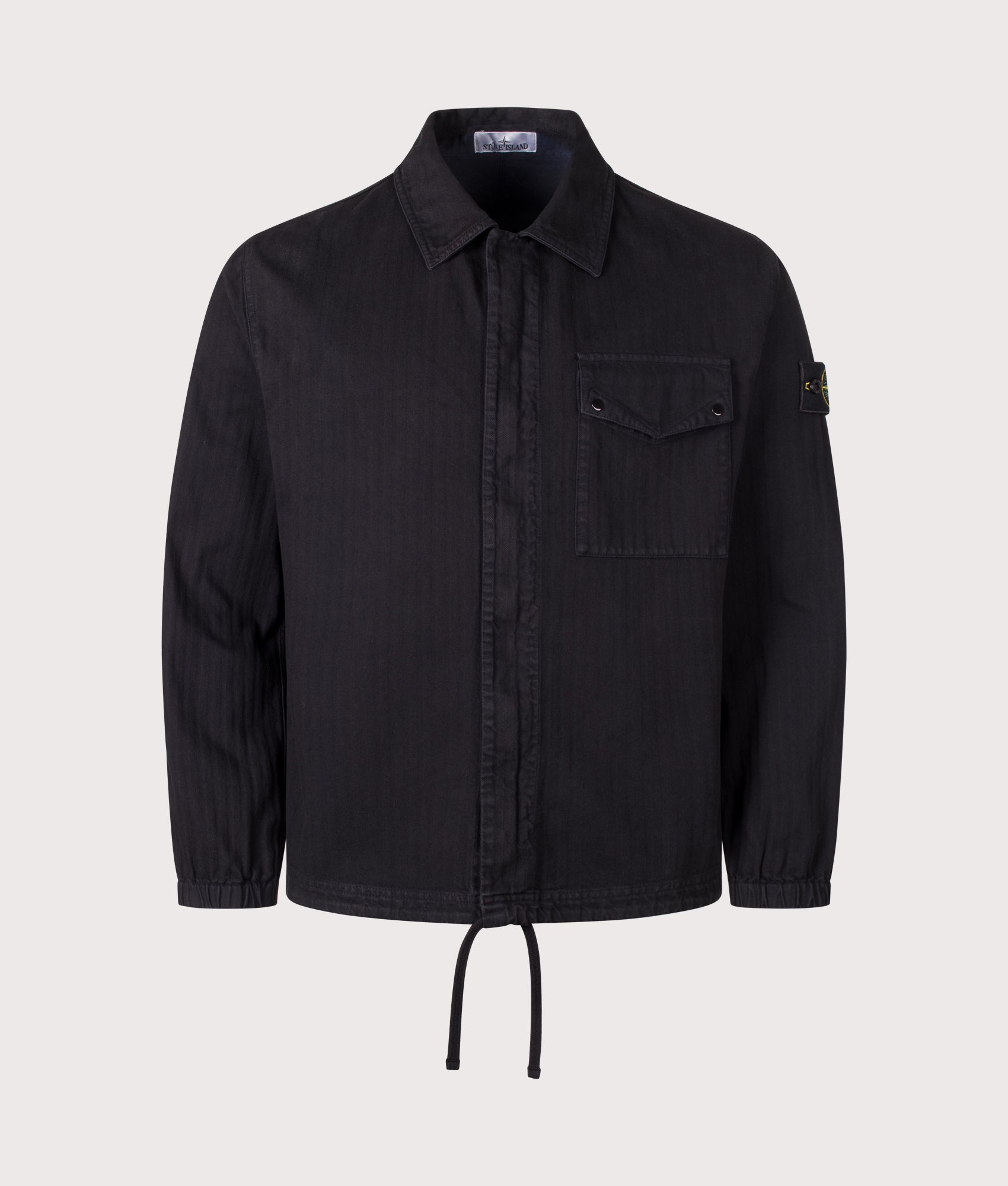 Stone Island Organic Cotton Twill Overshirt in Black at EQVVS Menswear. Front shot.