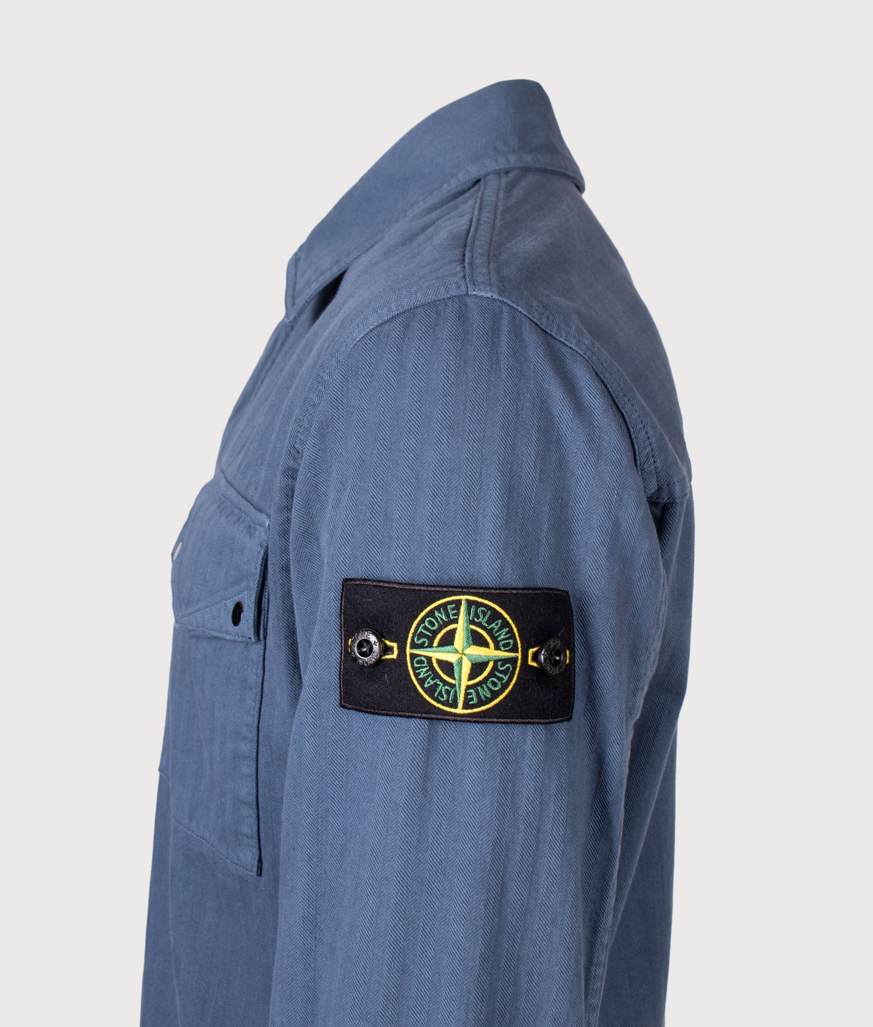 Stone Island Organic Cotton Twill Overshirt in Slate Blue at EQVVS Menswear. Detail shot.