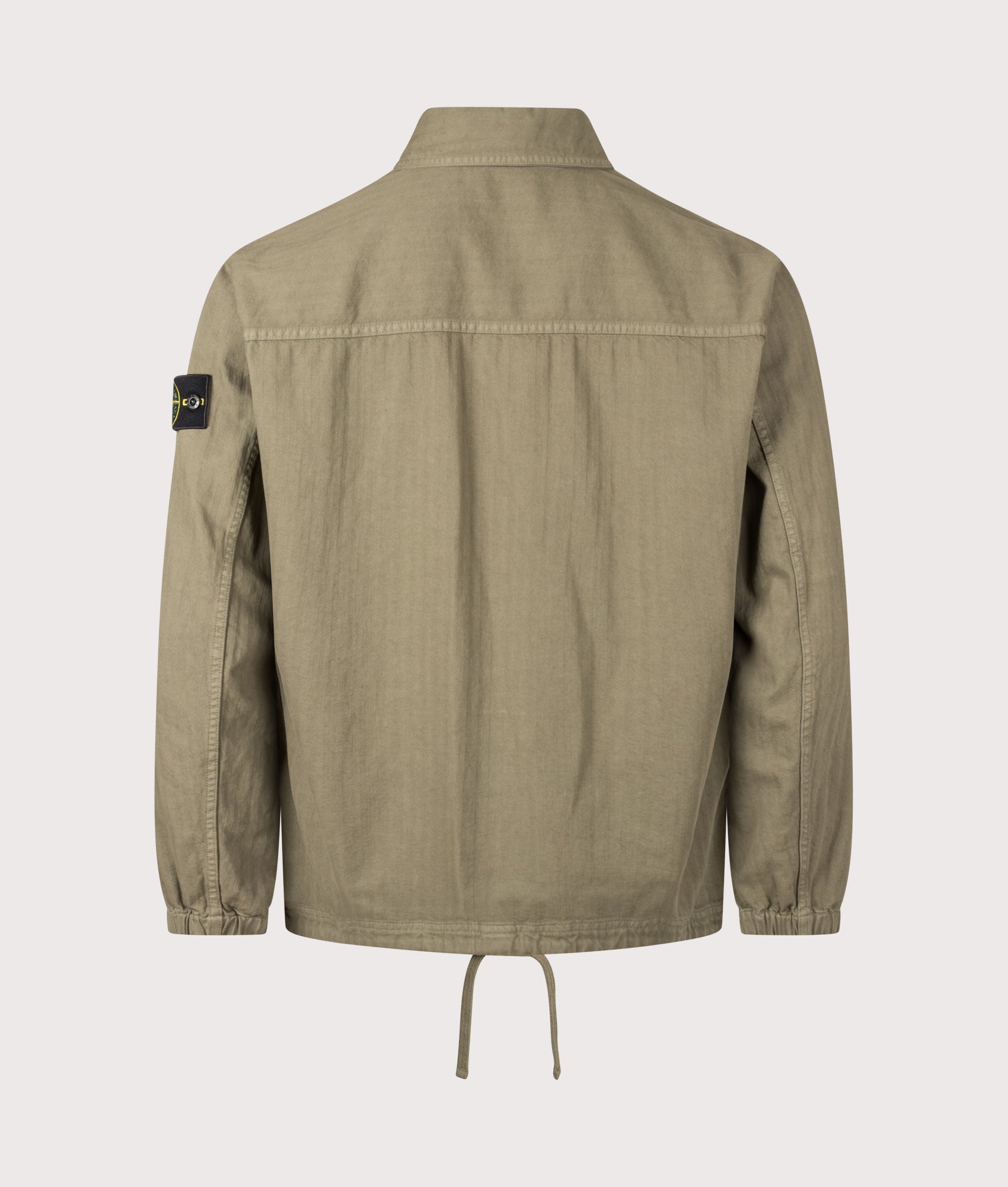 Stone Island Cotton Herringbone Overshirt in Military Green at EQVVS Menswear. Back shot.