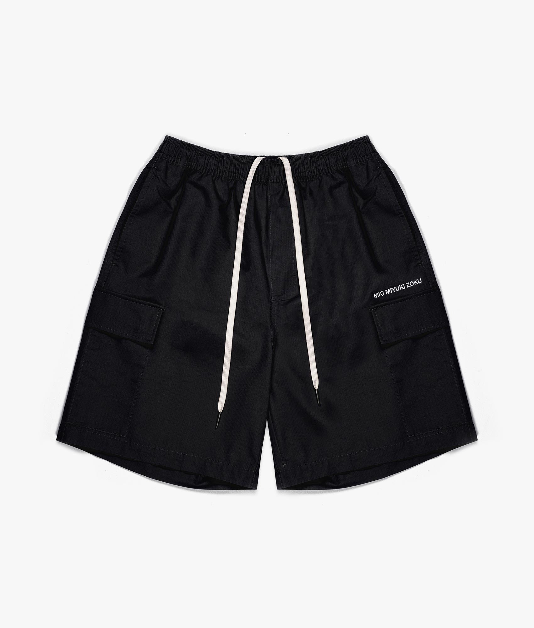 Relaxed Fit Ripstop Cargo Shorts by MKI MIYUI ZOKU. EQVVS Front Flat Shot.