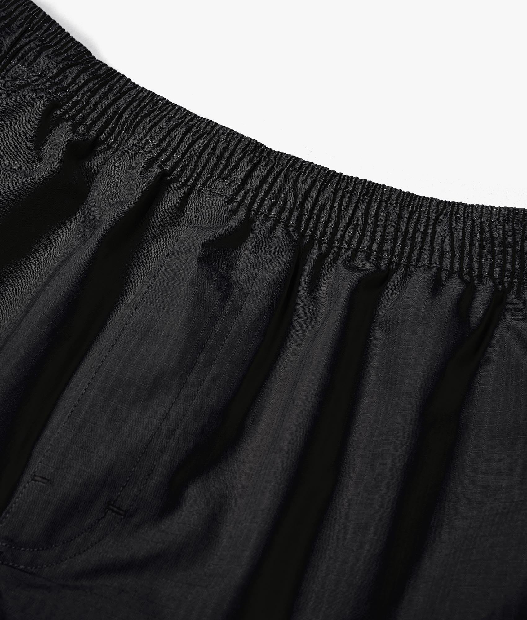 Relaxed Fit Ripstop Cargo Shorts by MKI MIYUI ZOKU. EQVVS Detail Shot.